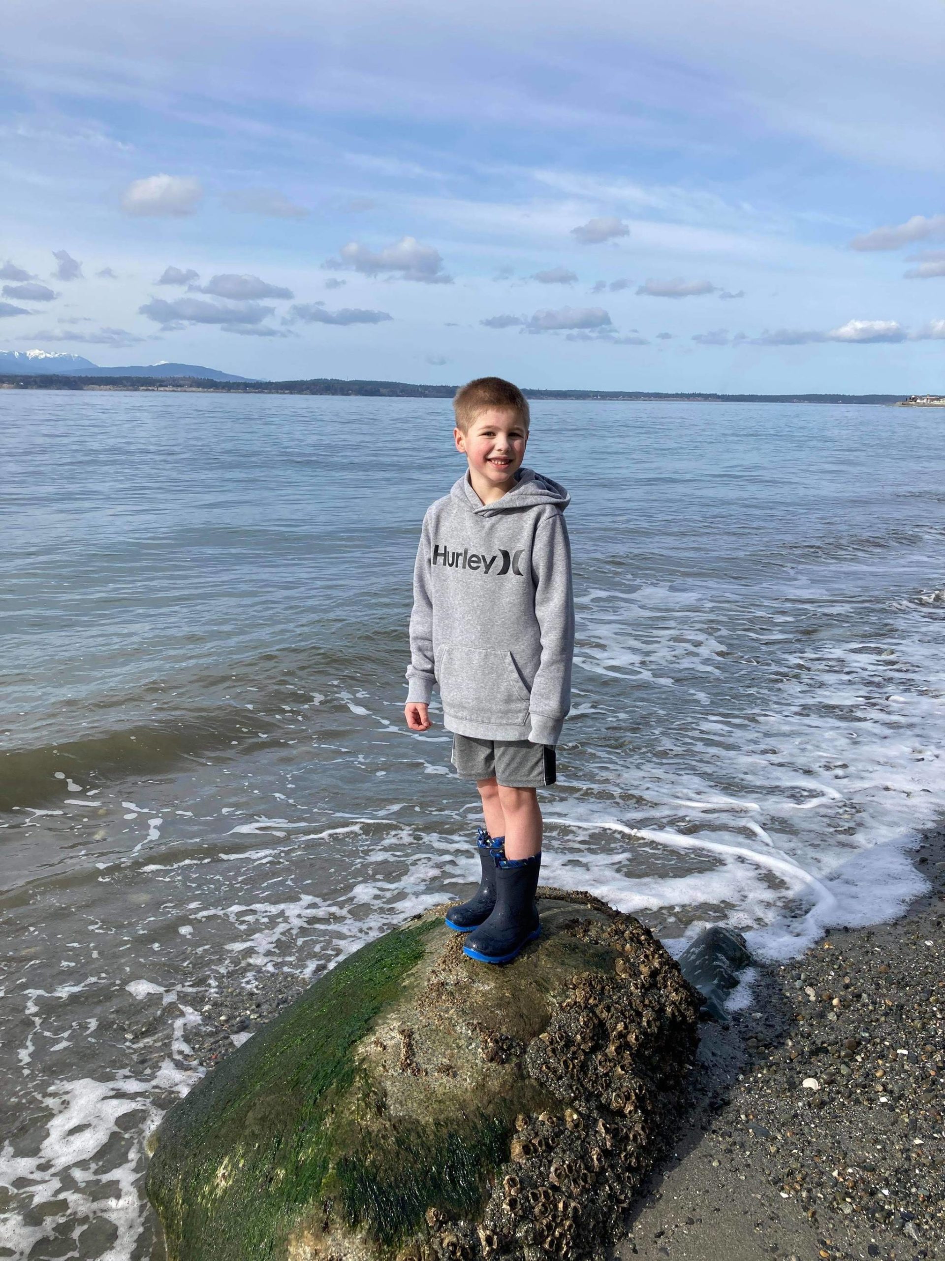 Blake Lewis, 7, at Bush Point where he threw a message in a bottle out to sea. Ruth Smethers later picked it up in Port Townsend. Photo provided by Jessie Lewis