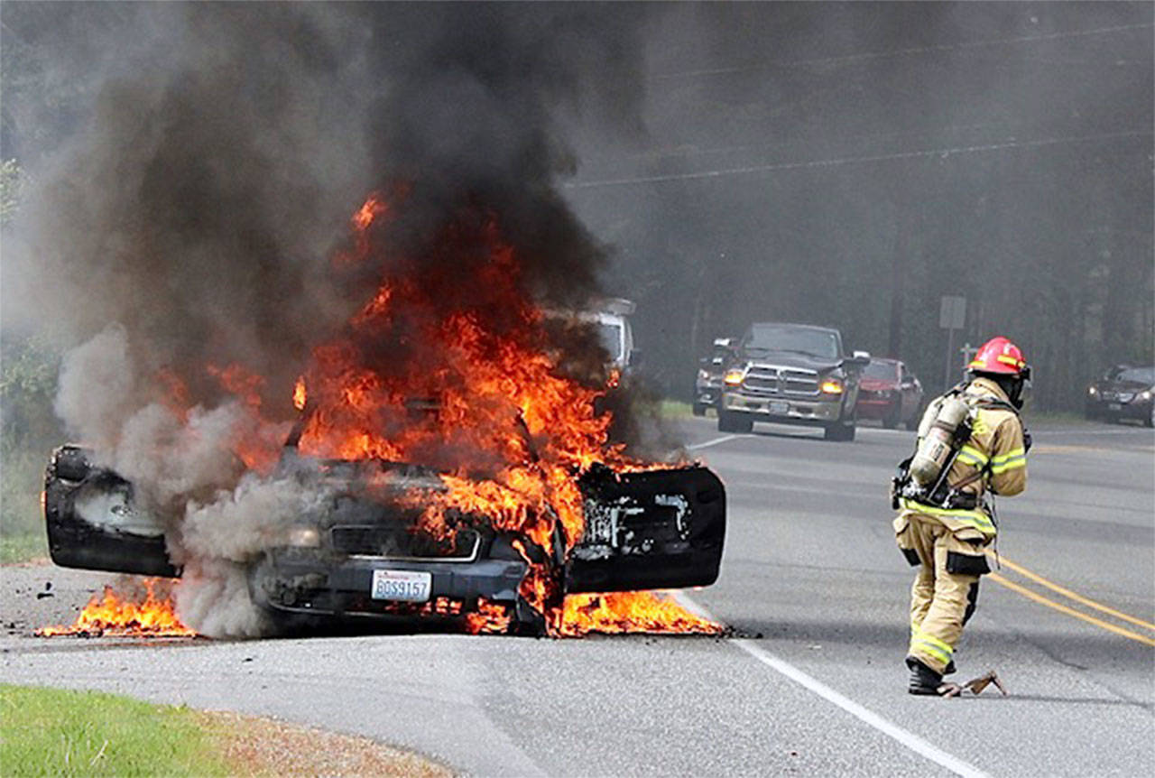 Photo by Bryan Fick/West Coast Fire Media
Oak Harbor firefighters responded to a car fire on Goldie Road on May 12, 2020. Nobody was injured.