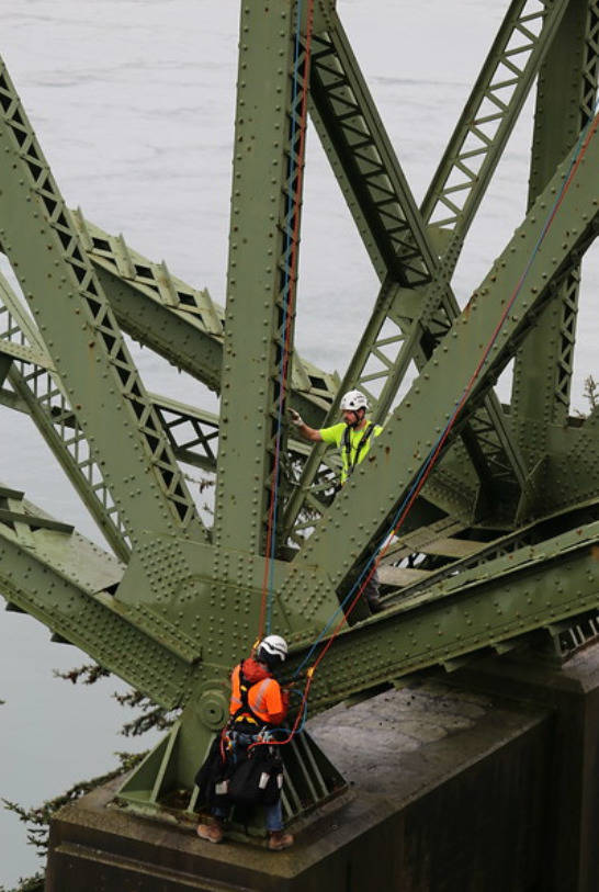 Worker will begin wrapping the Deception Pass bridge this month as they try to complete the project by the end of the year. The parking lot on Whidbey Island next to the bridge will be closed until March. WSDOT photo