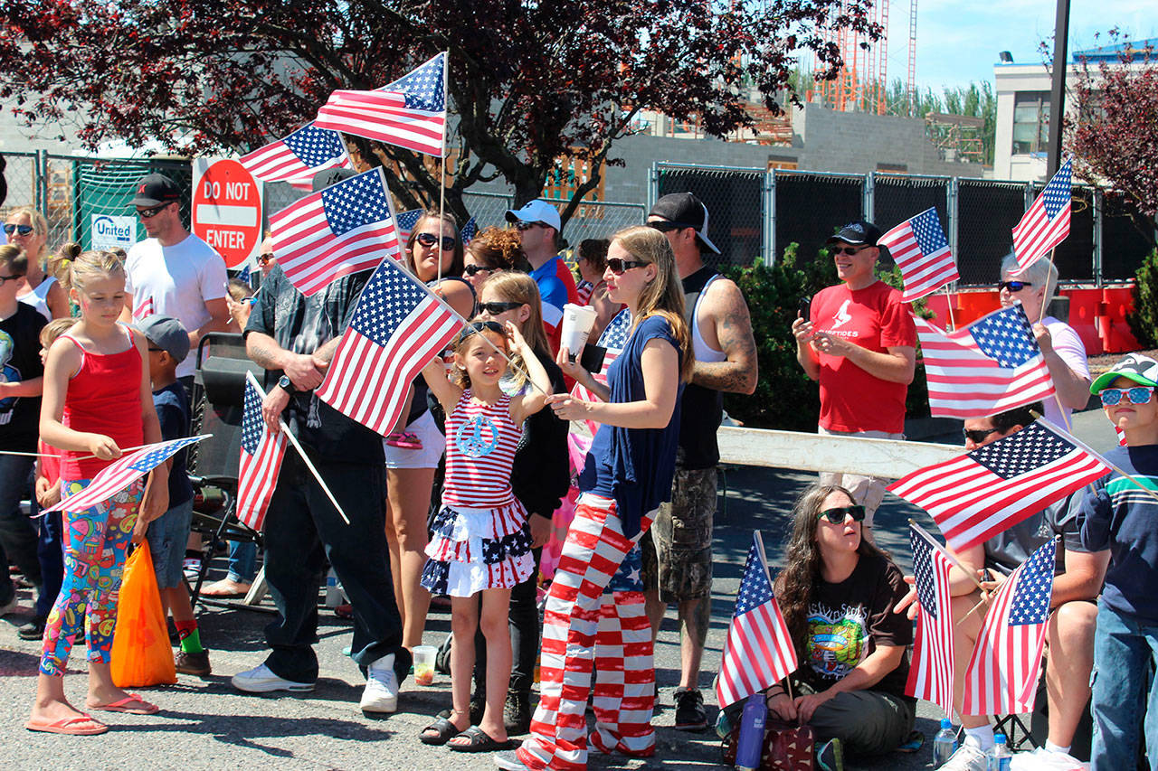 A crowd gathered to watch the Oak Harbor Fourth of July parade in 2017. There will be a parade this year to celebrate the Fourth after it was canceled during the coronavirus pandemic last year. File photo
