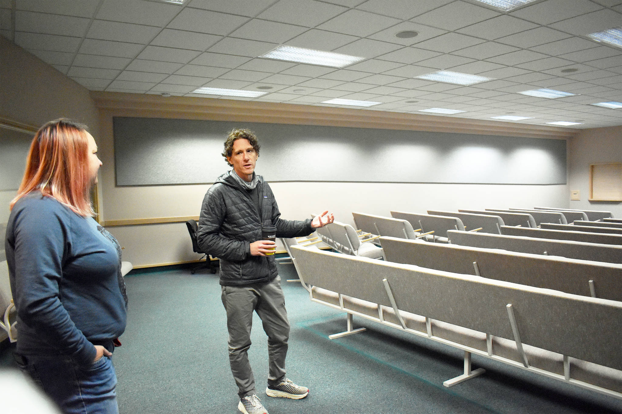 Whidbey Homeless Coalition Executive Director Jonathan Kline explains how 15 bunks will be set up in the sanctuary of the former Jehovah’s Witness church outside Coupeville. Photo by Emily Gilbert/Whidbey News-Times