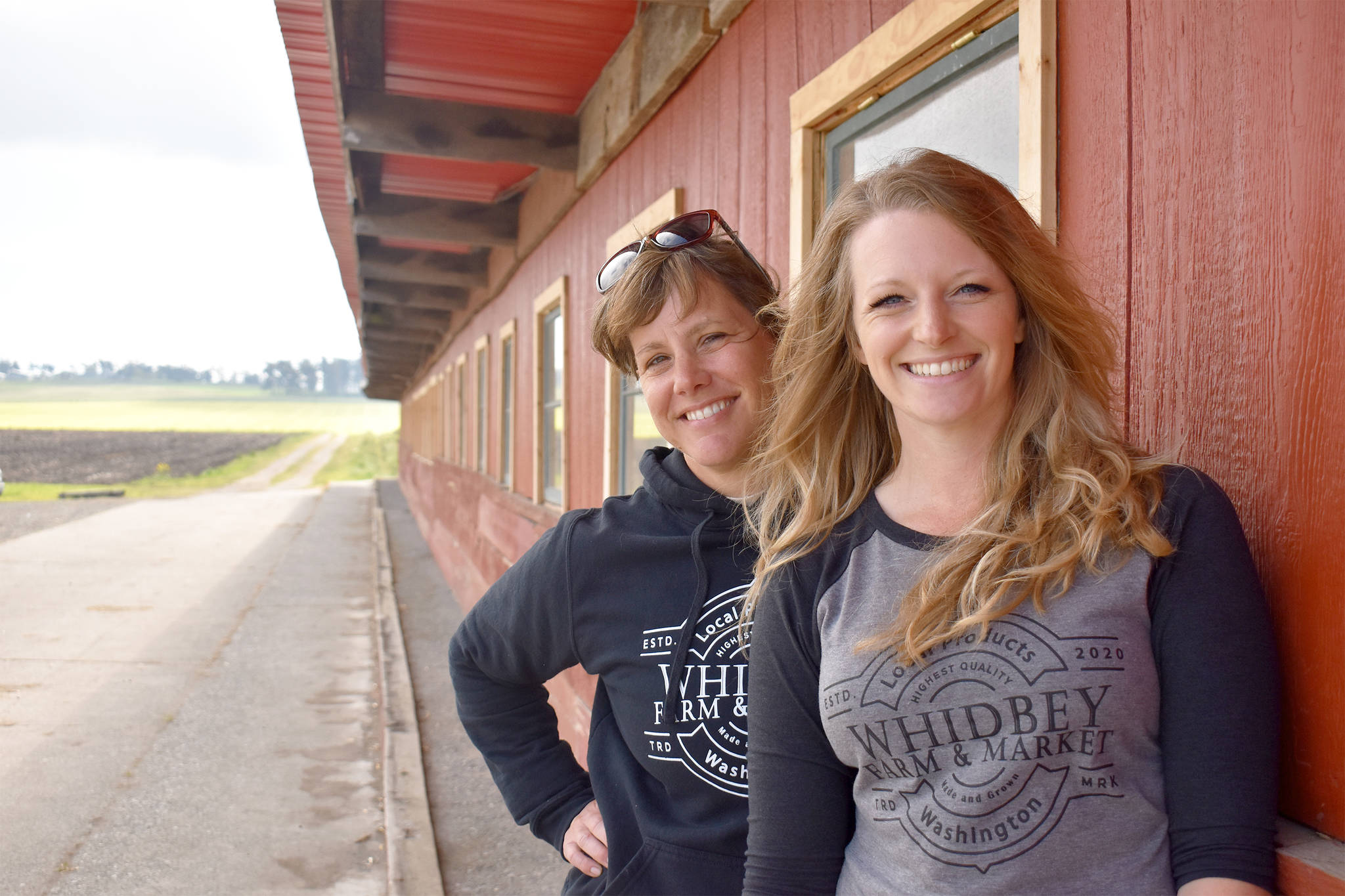 Shannon Hamilton, front, and Wendi Hilborn own Whidbey Farm and Market on Monroe Landing Road outside of Oak Harbor. Photo by Emily Gilbert/Whidbey News-Times