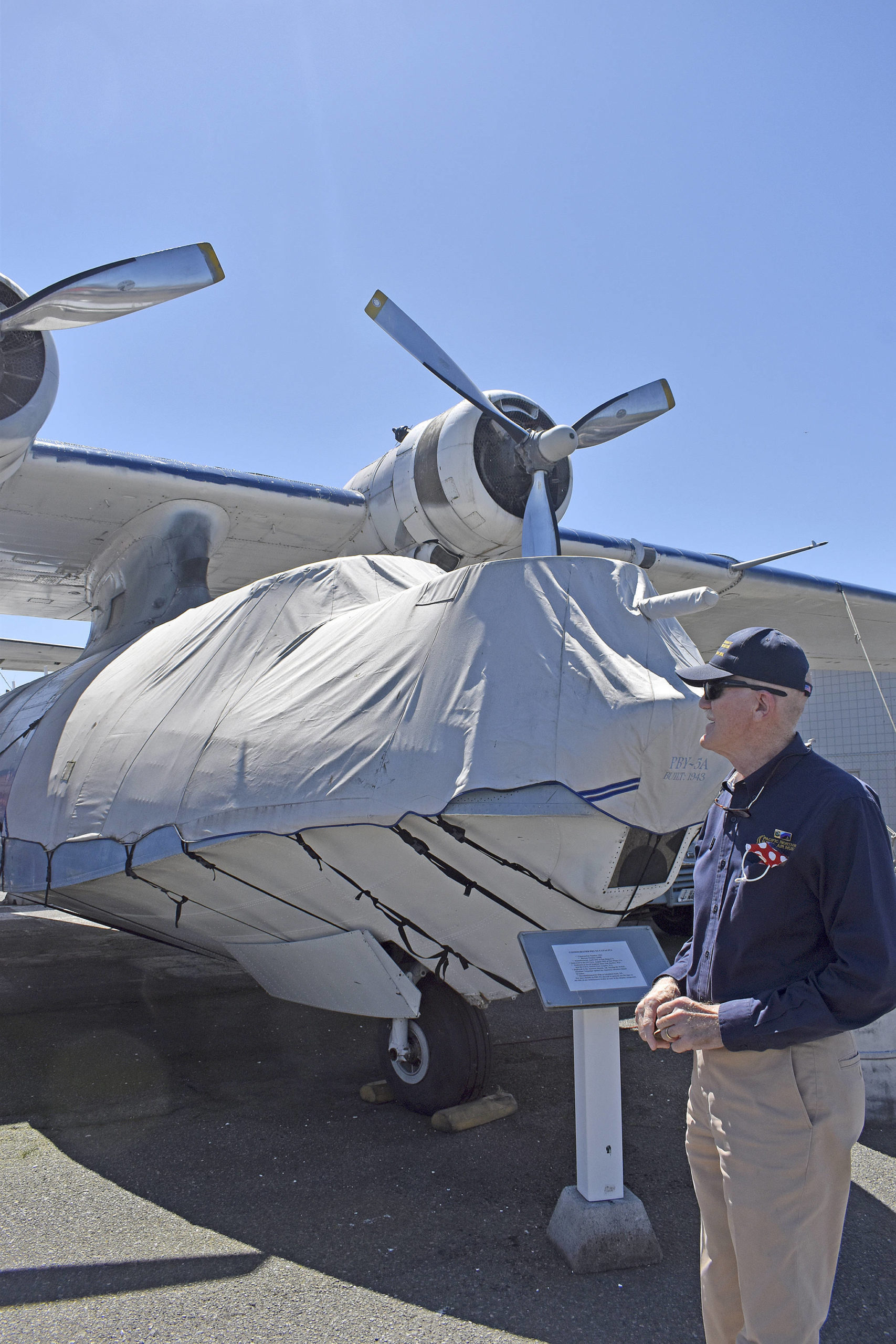 Pacific Northwest Naval Air Museum President Wil Shellenberger is hoping to find more volunteer docents so the museum can show off the PBY-5A Catalina aircraft’s interior to the public. Photo by Emily Gilbert/Whidbey News-Times.