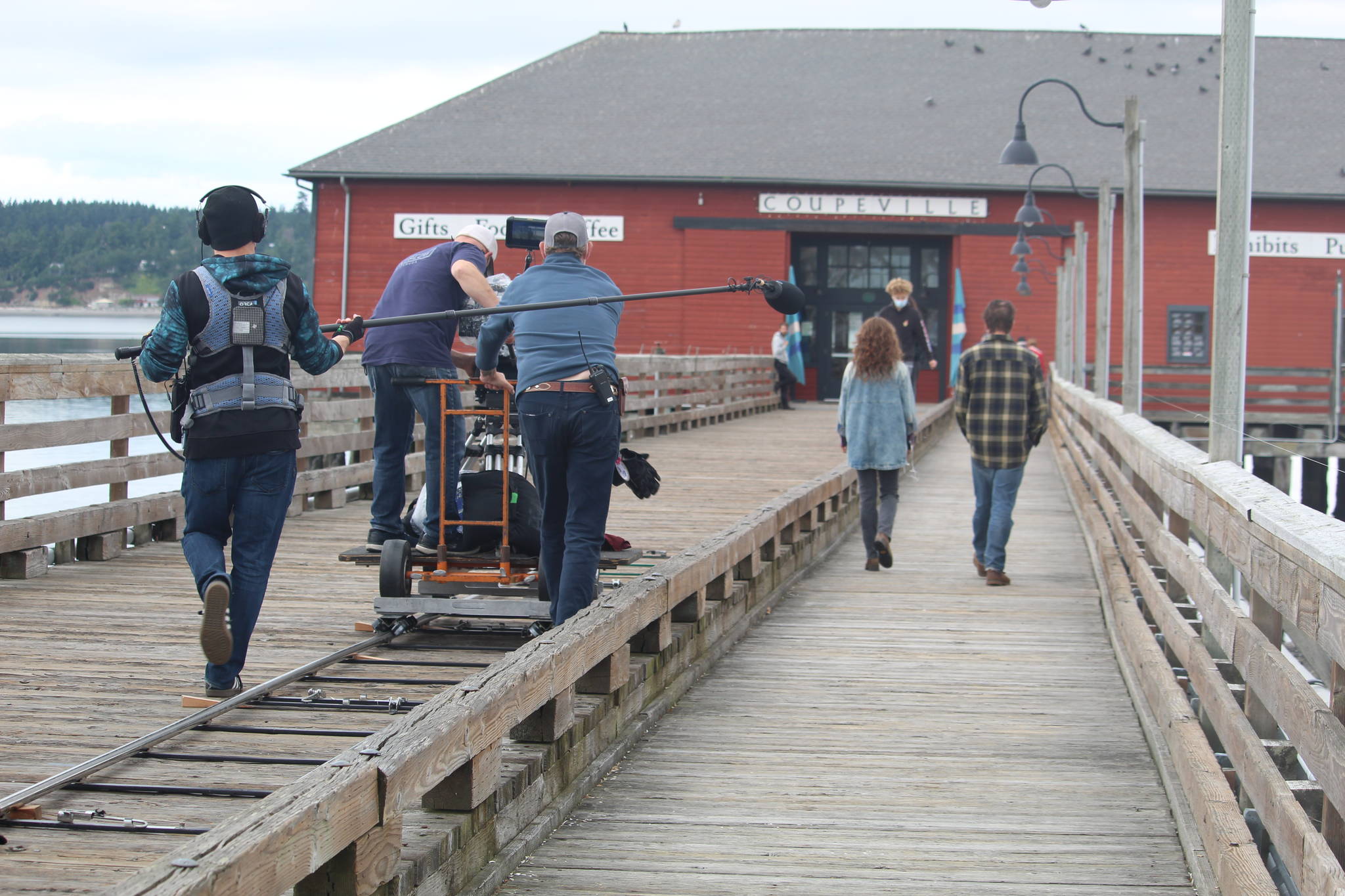 Chris Stack and Samantha Soule film a scene of “Midday Black, Midnight Blue.” (Photo by Karina Andrew/Whidbey News-Times)