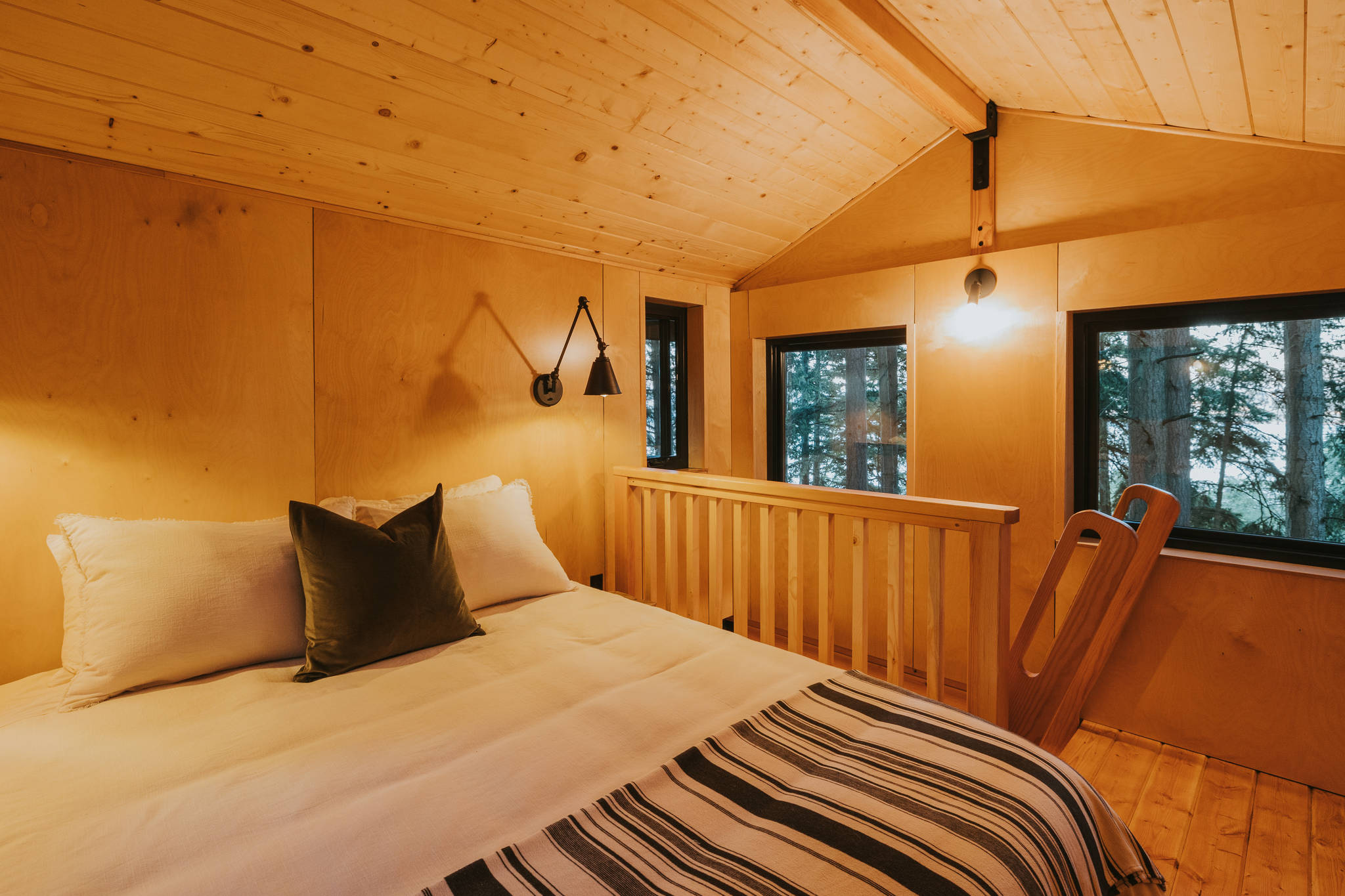 Guests will feel at home in the cozy but modern treehouse, which does have indoor plumbing. (Photo by Bryton Wilson)