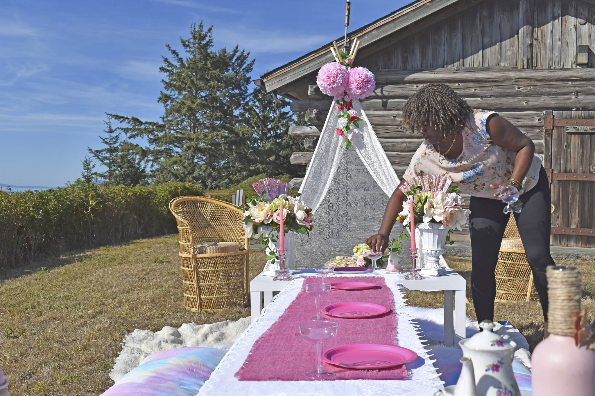 <p>Photo by Emily Gilbert/Whidbey News-Times</p>
                                <p>Cadesha Pacquette sets up a pop-up picnic spread similar to one she created for a young girl’s birthday party. Pacquette said her new venture has been popular with military families celebrating a spouse’s return from deployment, anniversaries or just to have fun outdoors.</p>