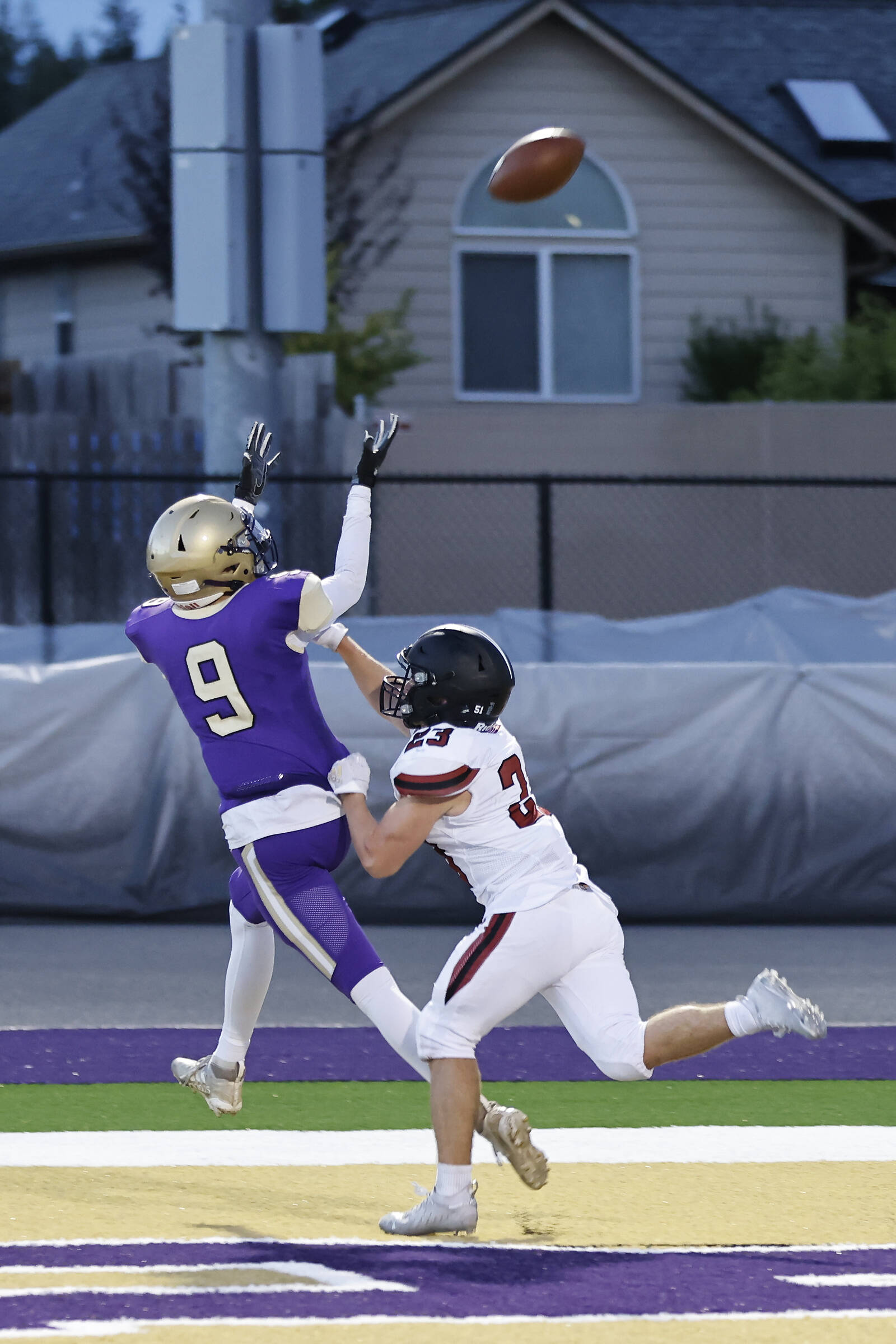 Photo by John Fisken
Oak Harbor senior Will Rankin anticipates the ball during Friday night’s home game. The Wildcats won 28-12 over the Cedarcrest Red Wolves.