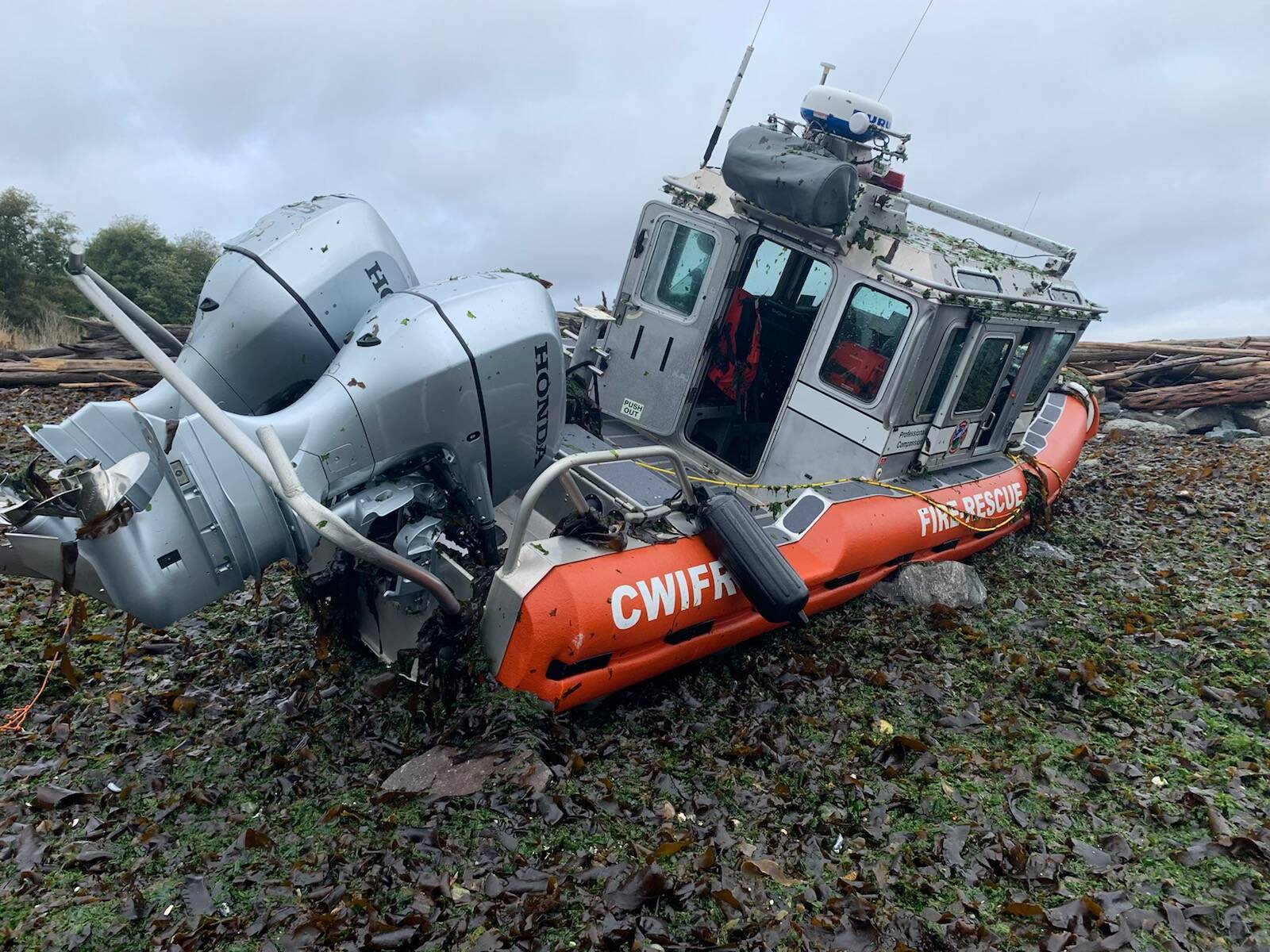 Photo provided
Two crew members aboard Central Whidbey Island Fire and Rescue’s SAFE boat, a marine rescue vessel, were uninjured after they jumped out as waves pounded it against the rocks and seawall in Greenbank. Fire Chief Ed Hartin said the boat lost steering during a storm.