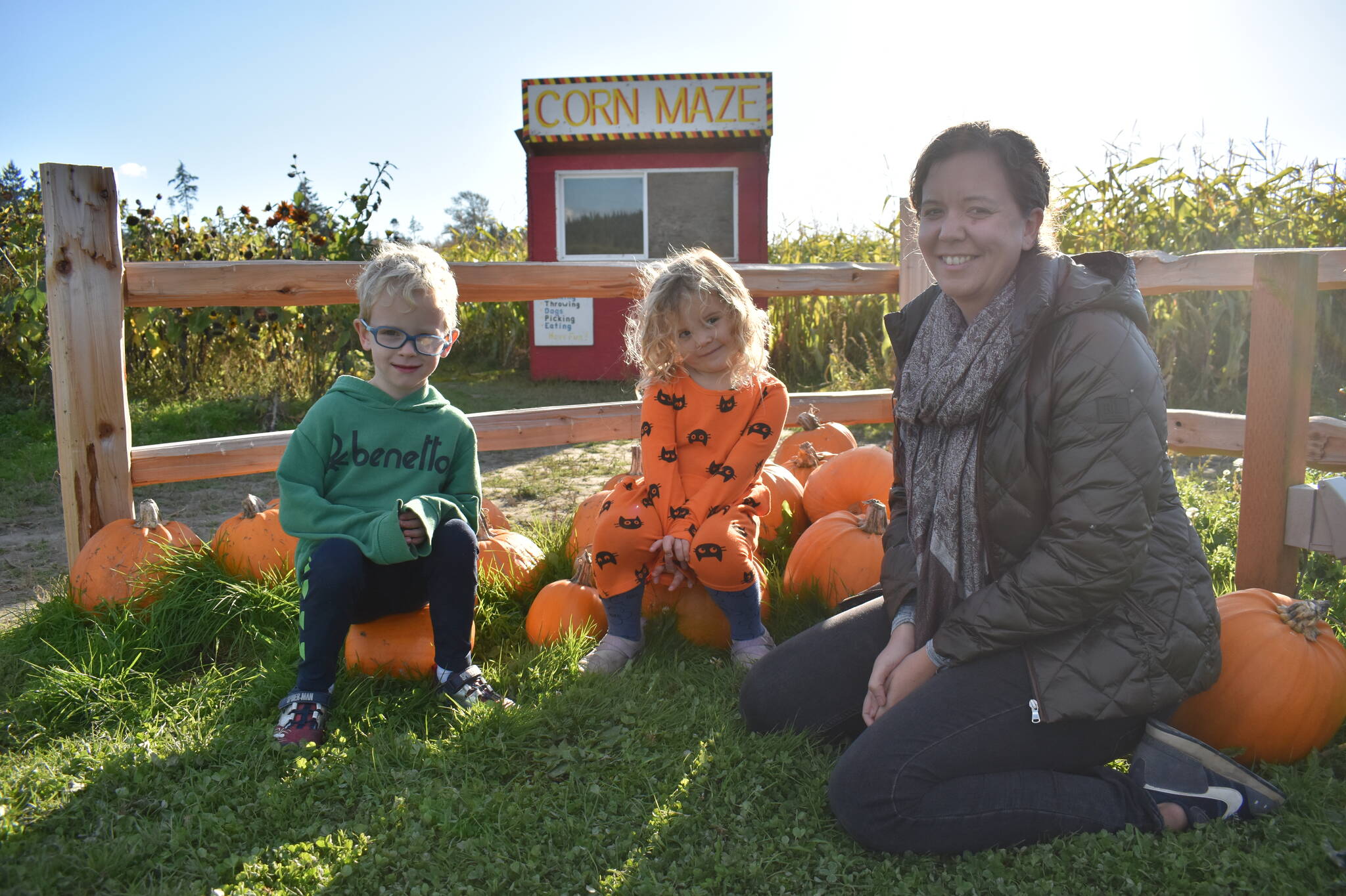 Photo by Emily Gilbert/Whidbey News-Times 
Bellevue residents Connor Dowd, 6, and his sister, Avery, 4, took a trip with their mom, Jennifer, to K & R Farms on North Whidbey.