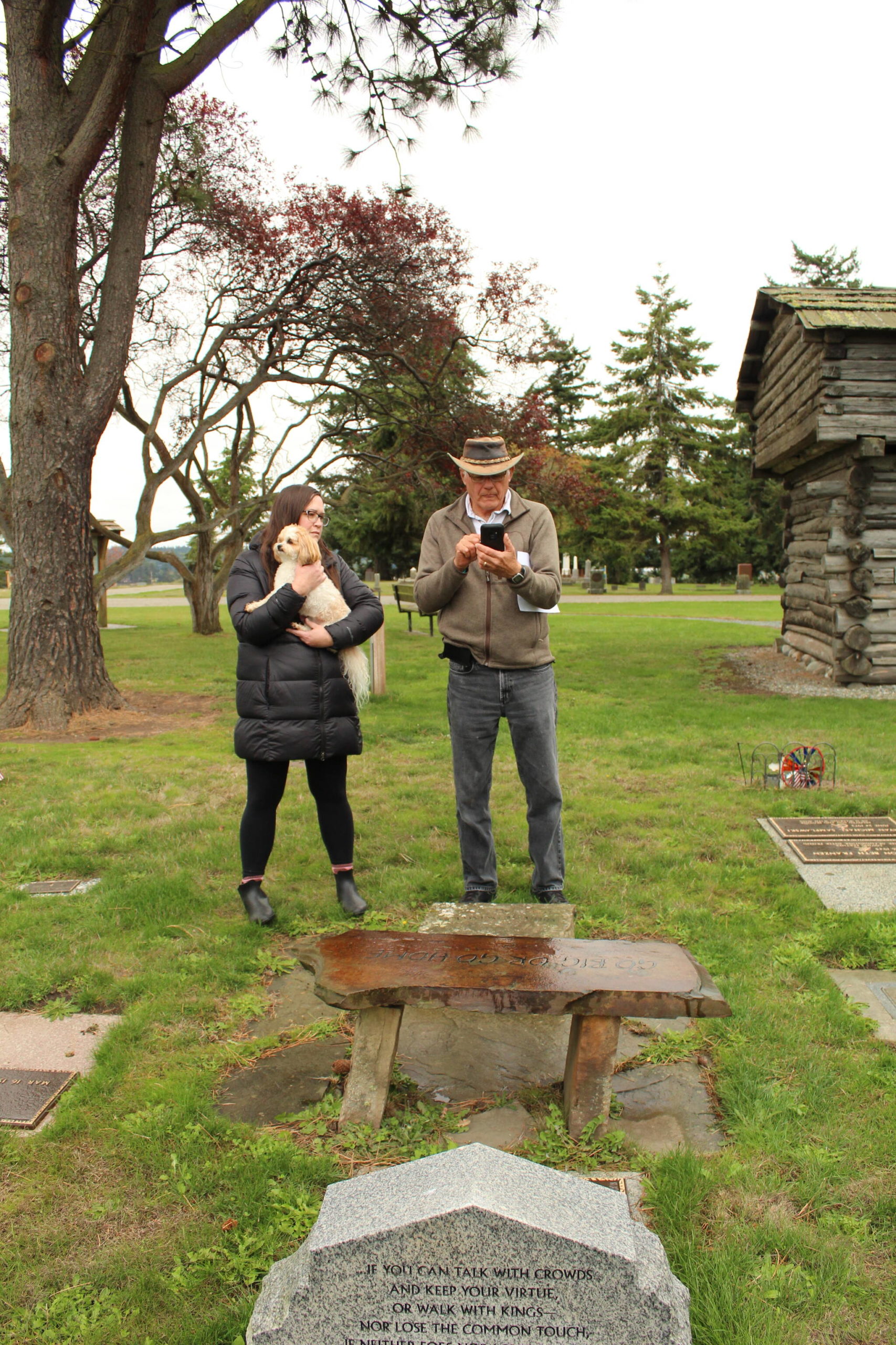 Photo by Karina Andrew/Whidbey News-Times
Laura Foley, left, and Don Meehan locate a grave in Sunnyside Cemetery using Find a Grave's GPS grave locator.