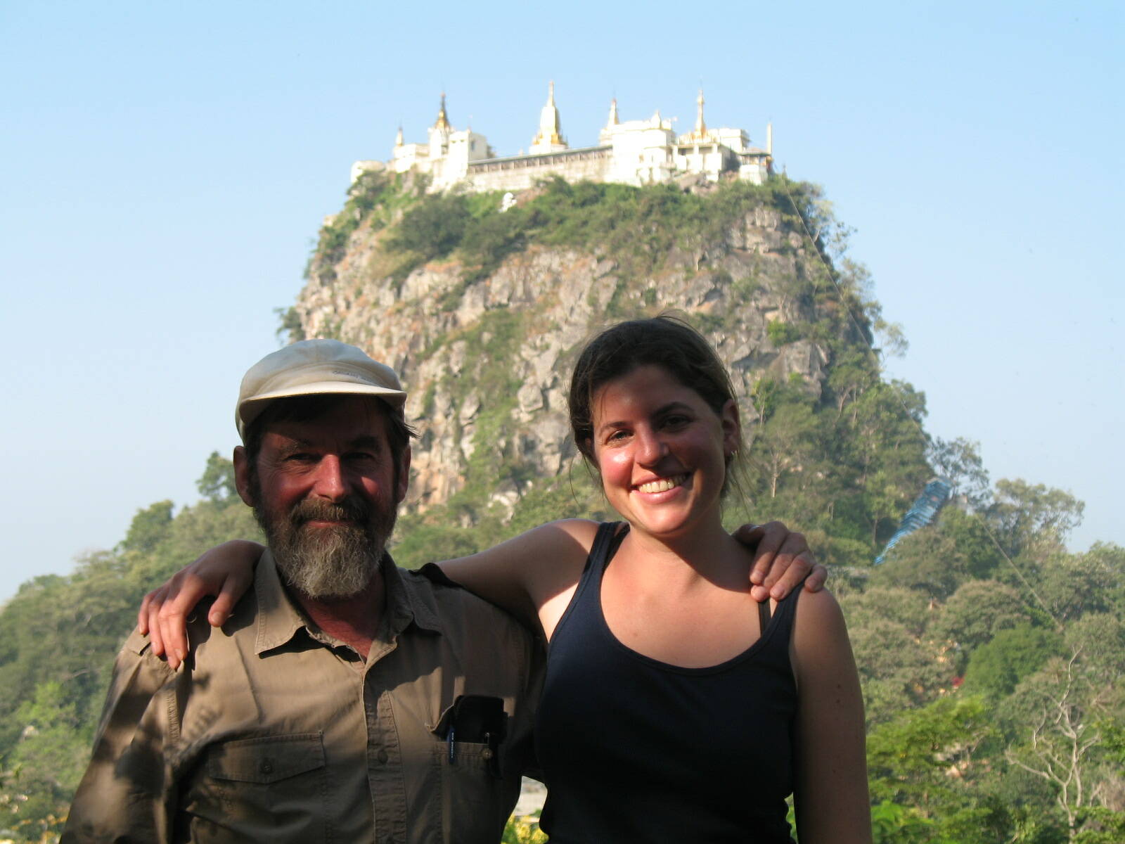 Doug and Anna Cosper stand before Mt. Popa, a holy shrine near Mandalay, Myanmar. Mt. Popa’s monastery houses the largest collection of “Nat” figures in Myanmar. In Buddhist traditions, Nats are spirits of humans that met tragic ends. (Photo provided)