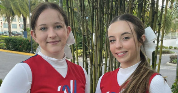 Photo provided
Cassidy Gore, left, and Ava Vallencourt get ready for their pregame performance at the Citrus Bowl.
