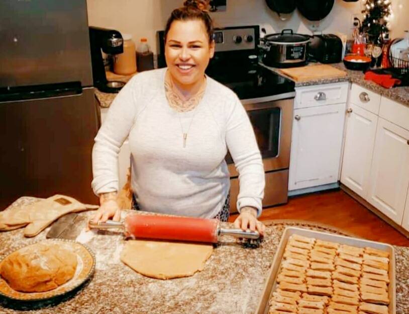 Photo provided
Suzanne Manthey rolls some dough for dog biscuits.
