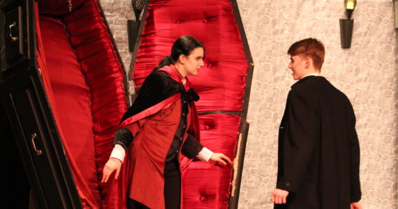 Photo by Karina Andrew/Whidbey News-Times
Count Dracula, played by Zoe Eisenbrey, emerges from his coffin to confront Jonathan Harker, played by Spencer Grubbs.