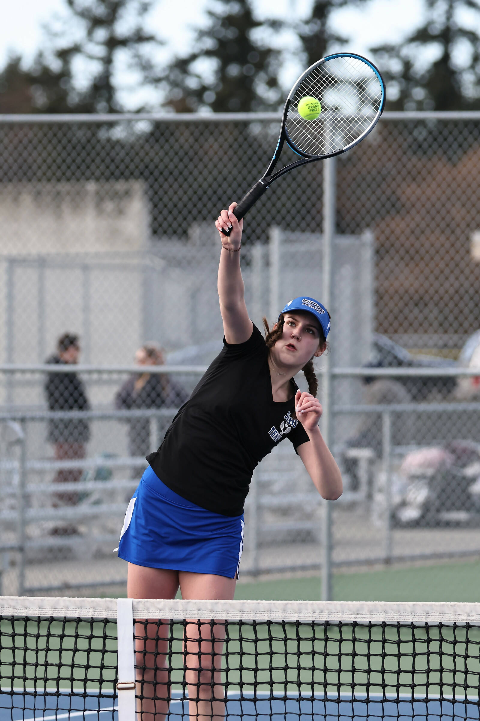 Photo by John Fisken
South Whidbey senior Maia Richards, No. 2 singles in varsity, returns the ball during the match against Oak Harbor.