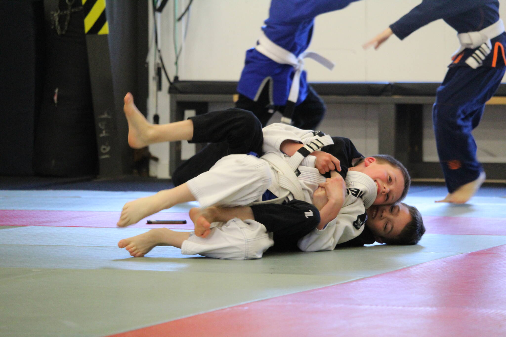 Photo by Karina Andrew/Whidbey News-Times
Ryan Zimmerman, front, practices with Eli Williams in the kids’ Jiu Jitsu class.
