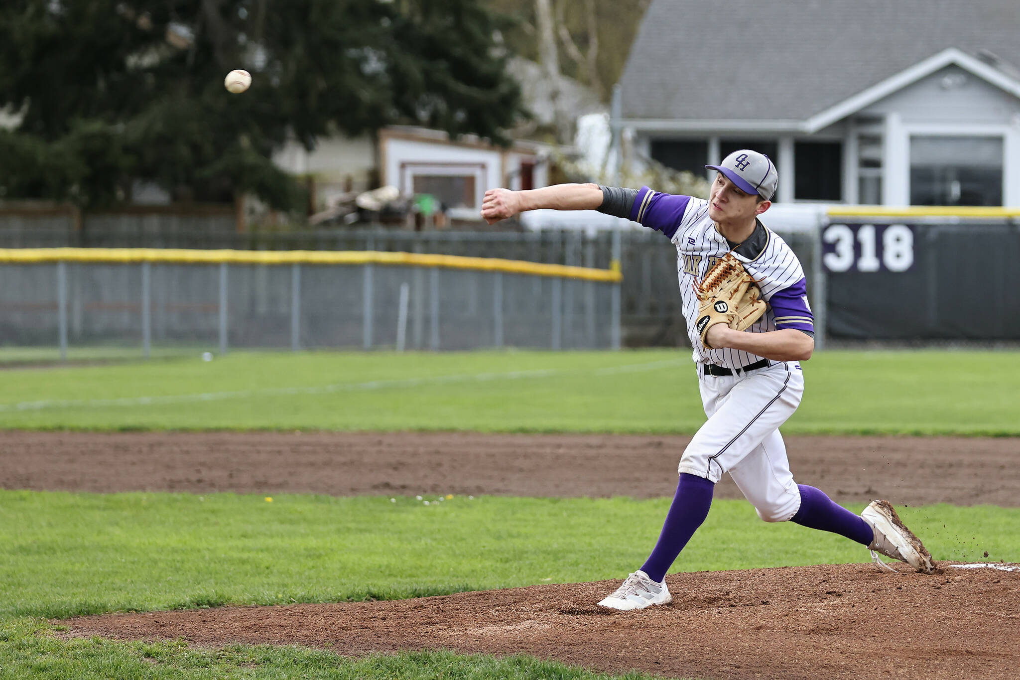 Photo by John Fisken
John Blankman pitches during a baseball game against Anacortes April 4. Oak Harbor won after a close game.