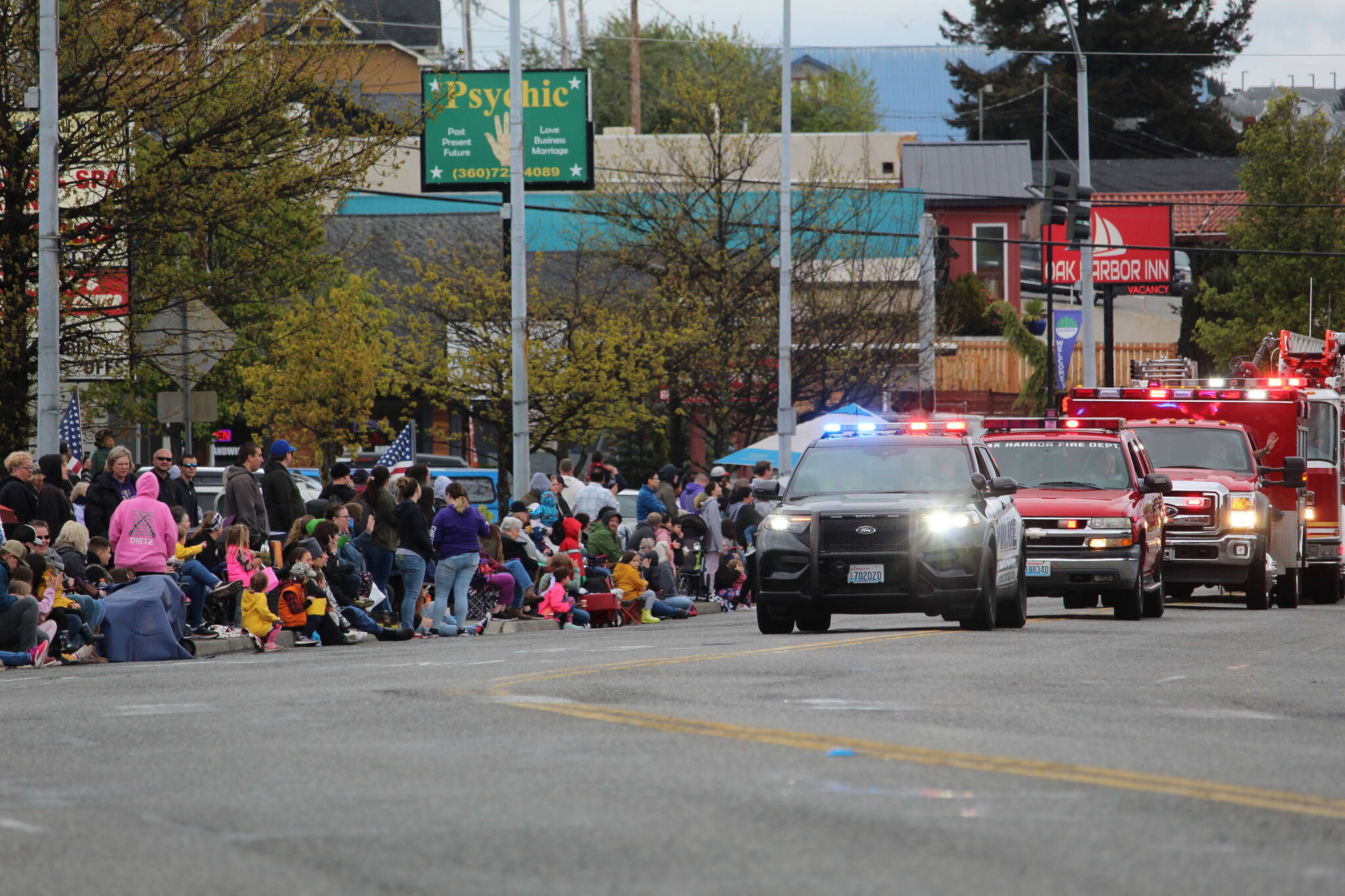 The Oak Harbor police kicked off the Holland Happening parade Saturday morning. (Photo by Karina Andrew/Whidbey News-Times)
