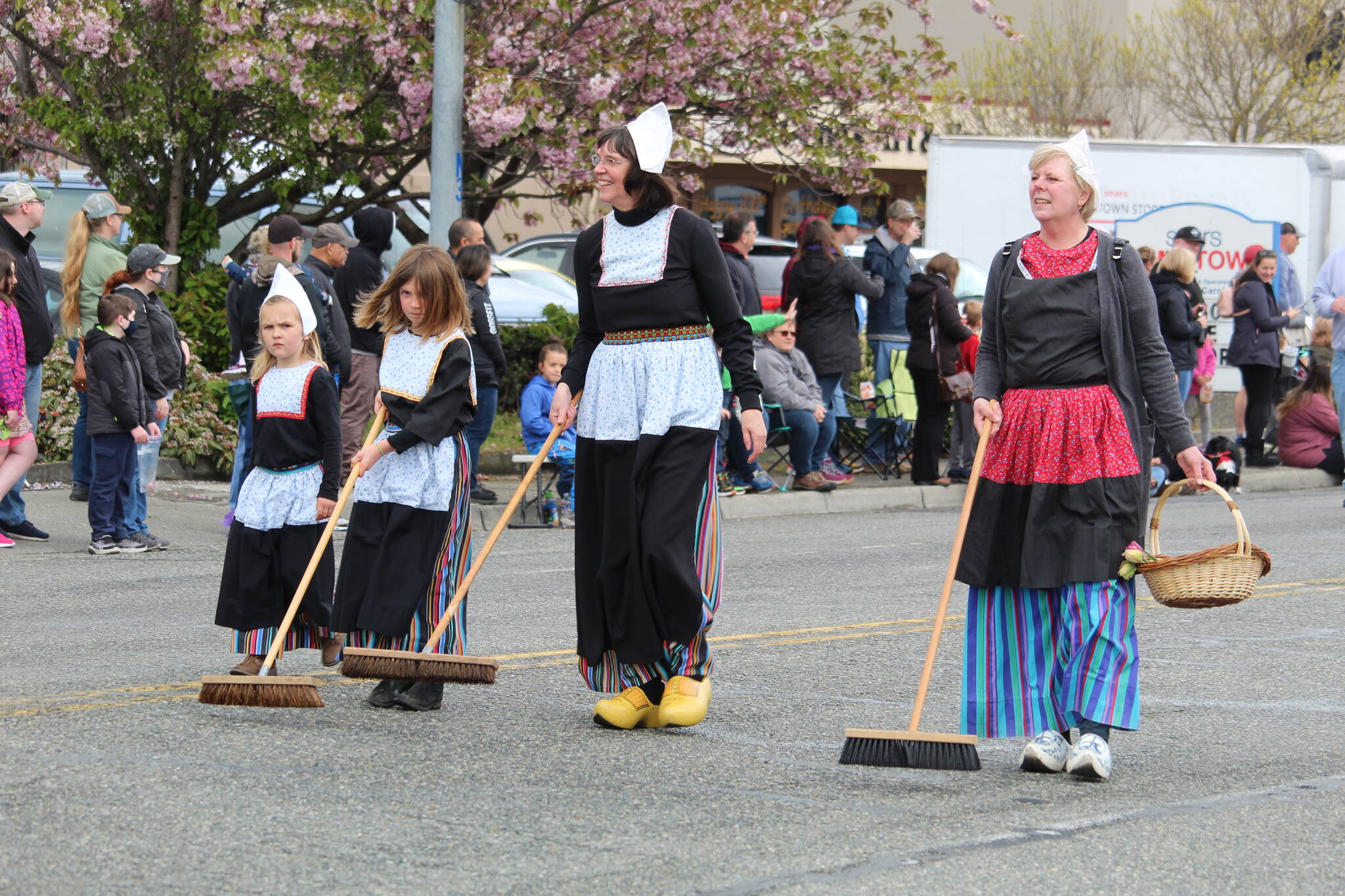 Street sweepers participate in the Holland Happening parade. (Photo by Karina Andrew/Whidbey News-Times)