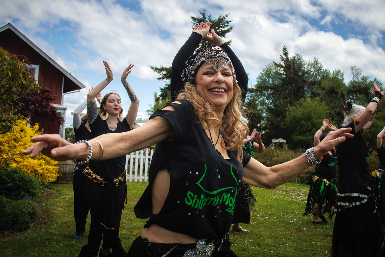 From left to right, Lisa Vega, Badeah Shirazi and Theresa DeLap belly dance at the Greenbank Farm. (Photo by David Welton)