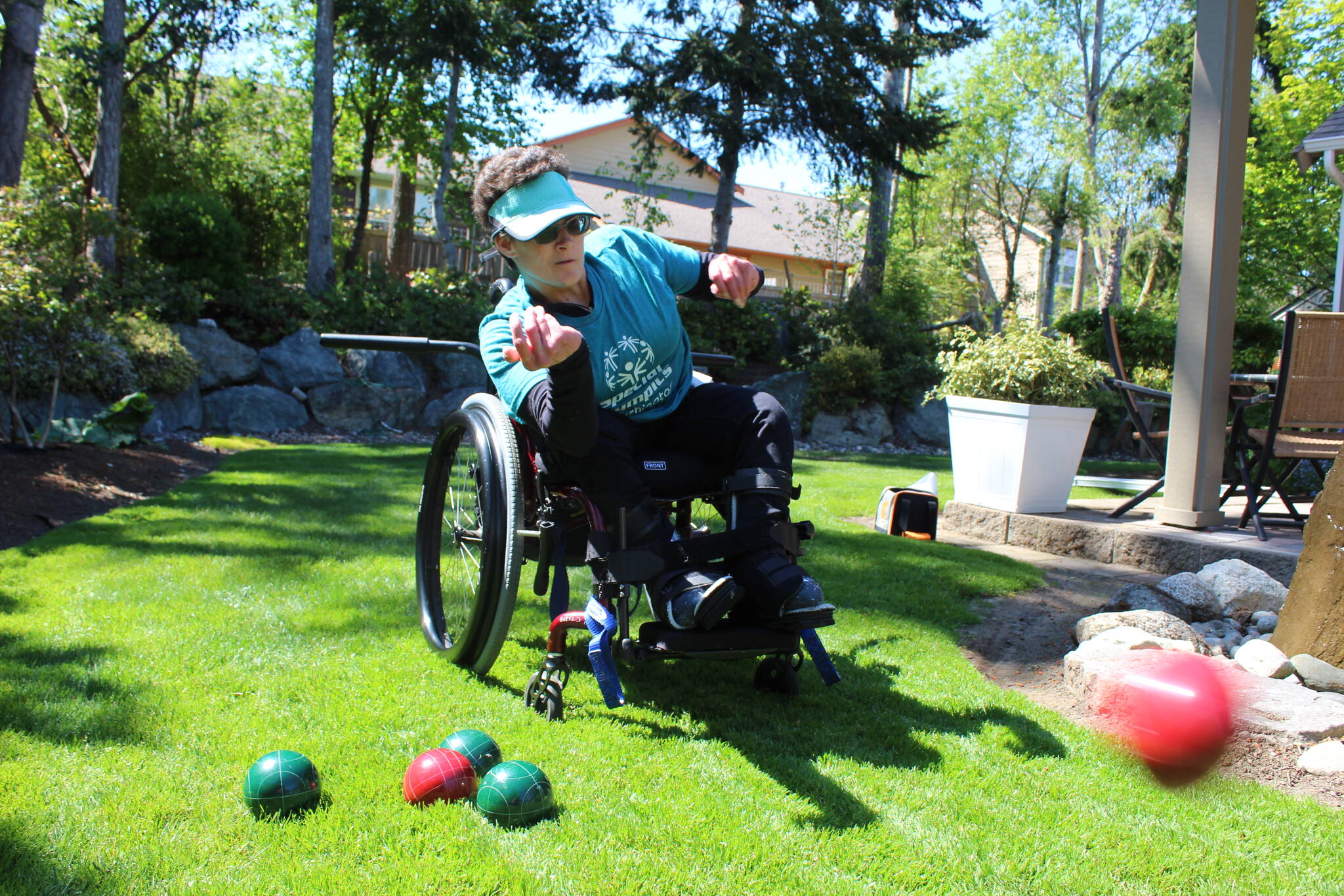 Jacquelyn Diaz practices bocce at her home in Oak Harbor in preparation for the Special Olympics USA Games next month. (Photo by Karina Andrew/Whidbey News-Times)