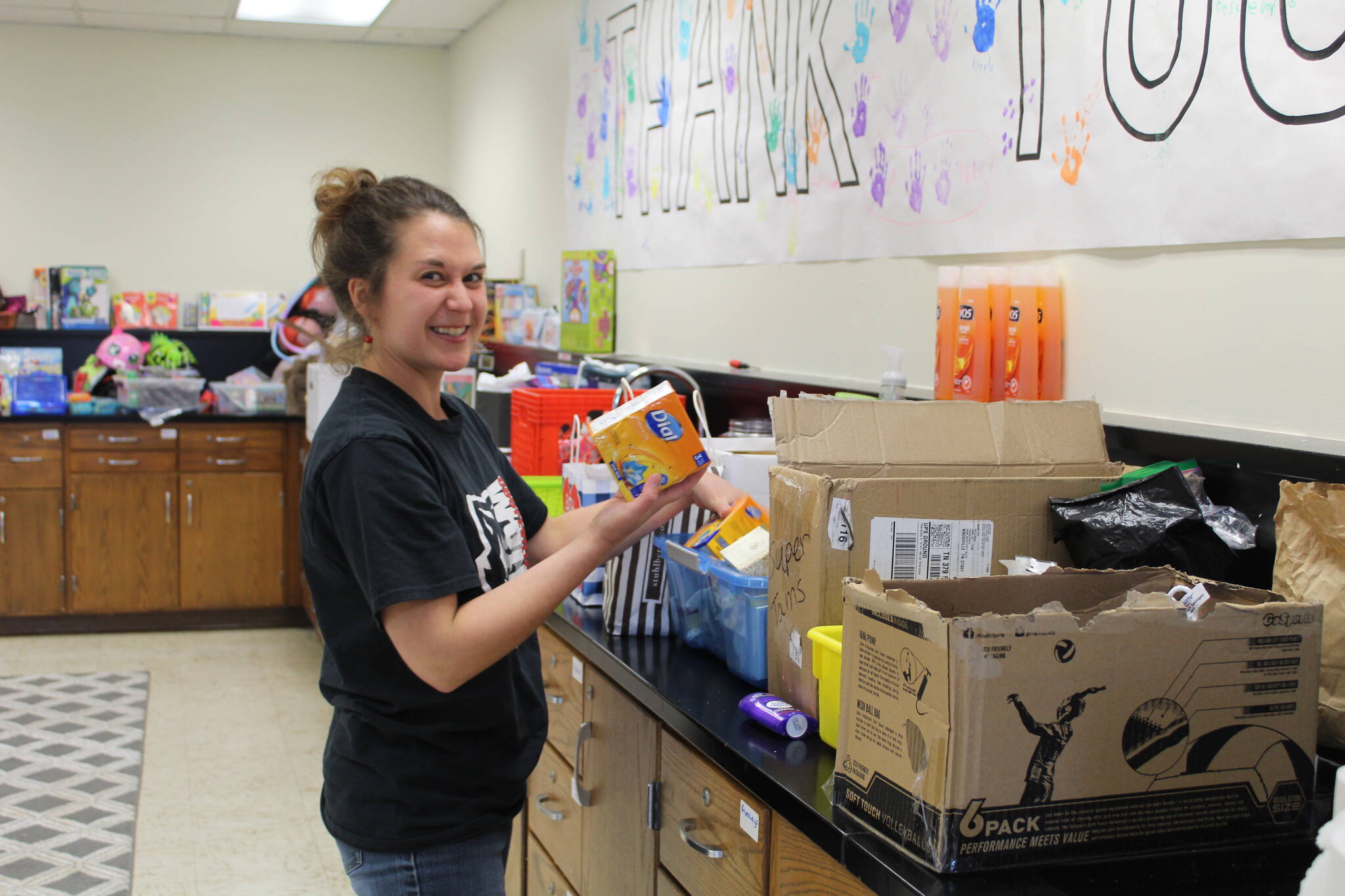 Photo by Karina Andrew/Whidbey News-Times
Arianna Bumgarner stocks soap and other hygiene products in Coupeville School District’s McKinney-Vento center.