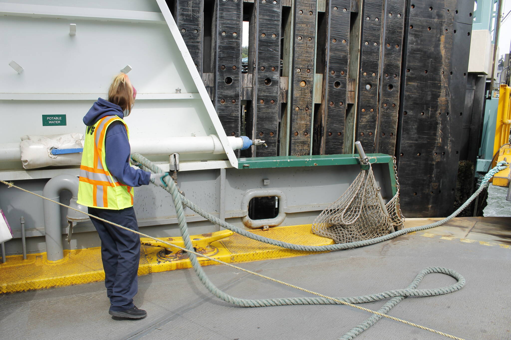 Photo by Kira Erickson/South Whidbey Record
A ferry worker ties up a vessel at the Clinton terminal.