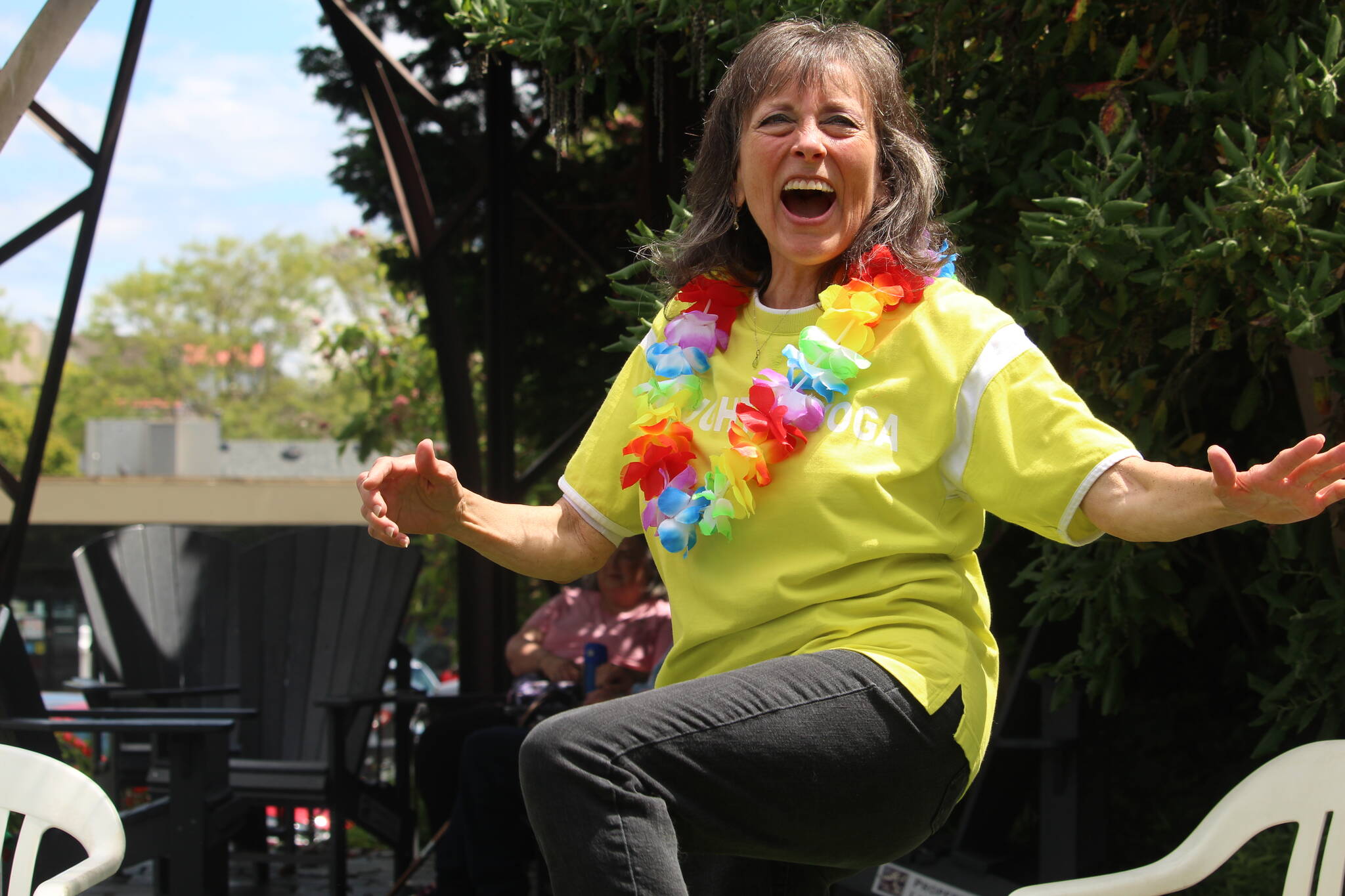 Tere Baker leads a laughter yoga session in Langley. The practice combines traditional yoga breathing with laughter to promote health, happiness and wellbeing.