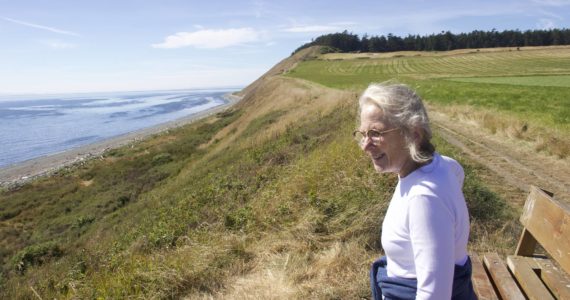 Photo by Rachel Rosen/Whidbey News-Times
Lynn Hyde, director of Historic Whidbey, looks over Ebey’s Landing where the history walk is taking place.