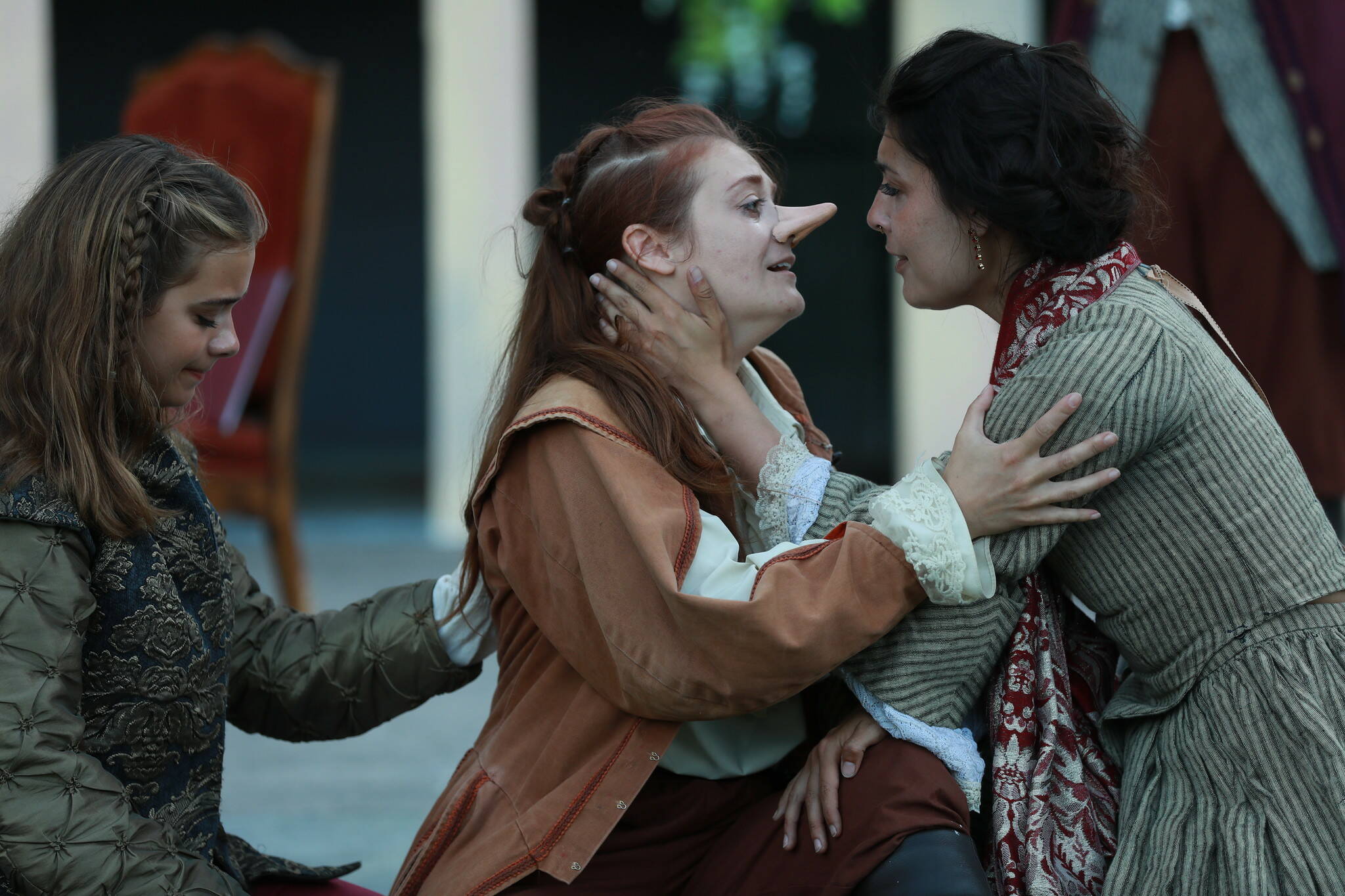 Photo by Michael Stadler
From left to right, Abigail Rhyne as Le Bret, Helen Roundhill as Cyrano and Mary Reagan as Roxane in “Cyrano de Bergerac: A Queeroic Comedy with Many Acts.”