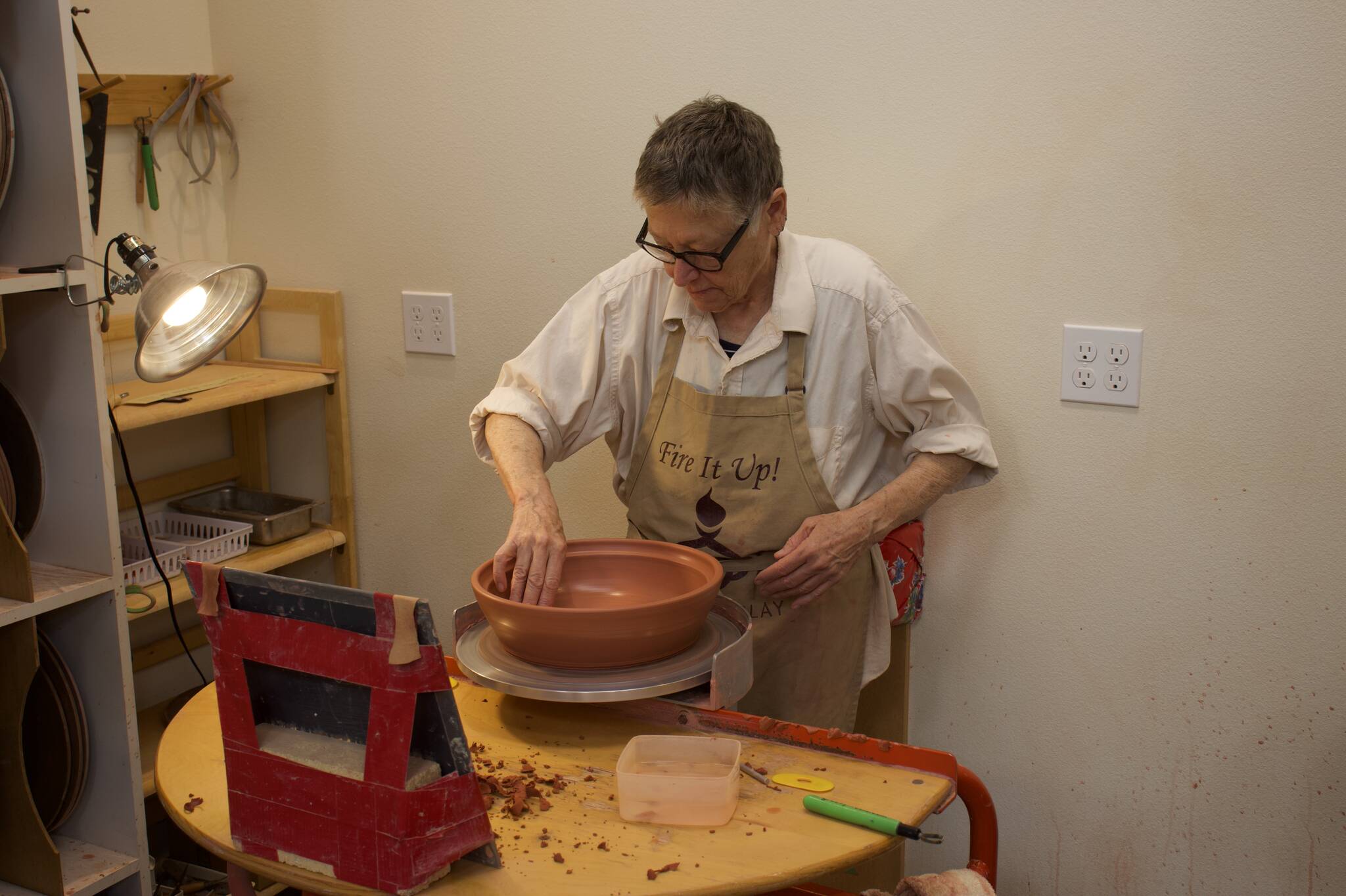 Robbie Lobell makes flameware pots, handmade cooking dishes that are made to cook in the oven or on the stovetop. (Photo by Rachel Rosen/Whidbey News-Times)