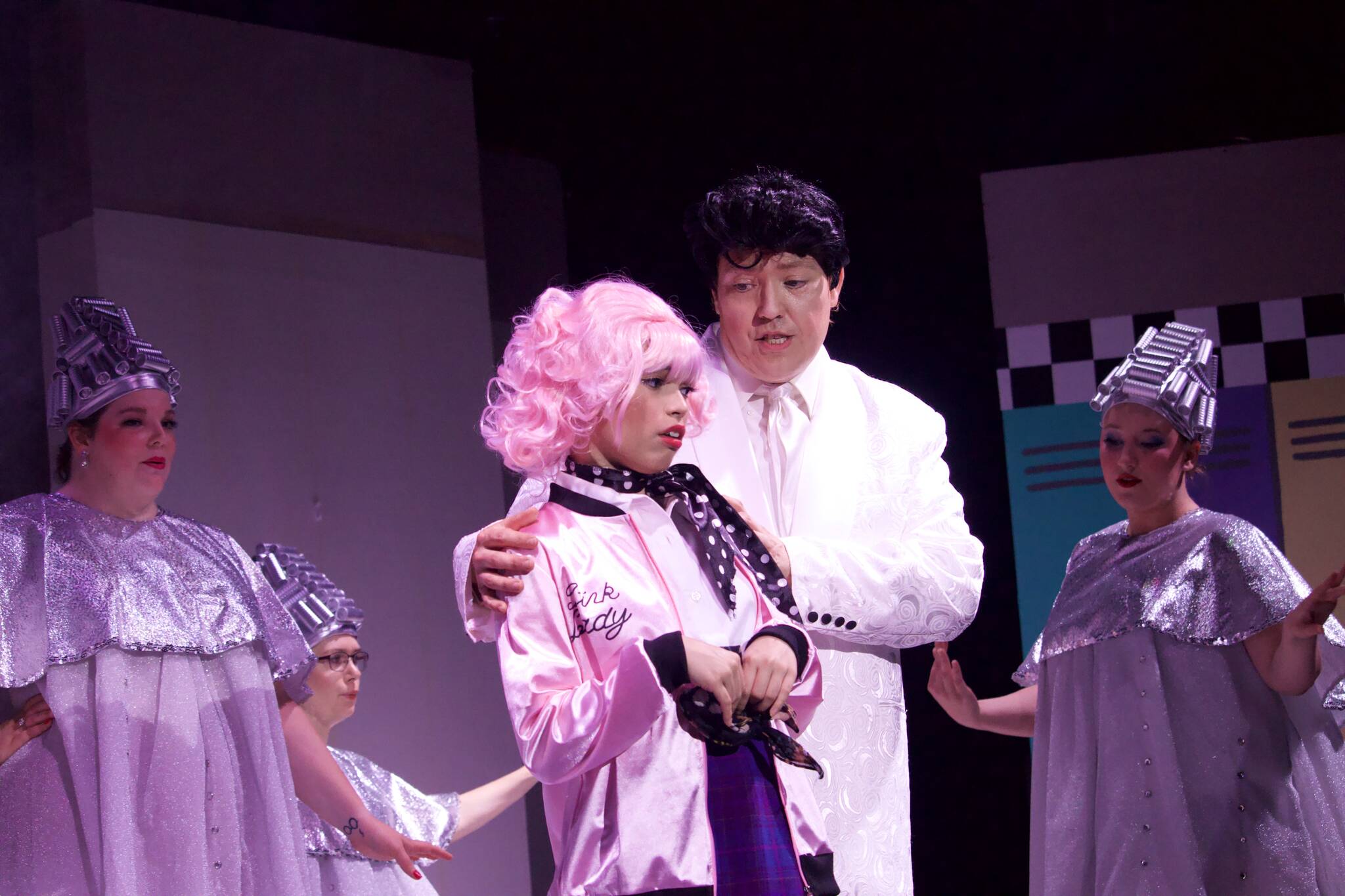 Marianne Campos plays Frenchy, the beauty school dropout. Andrew Huggins plays the angel. (Photo by Rachel Rosen/Whidbey News-Times)
