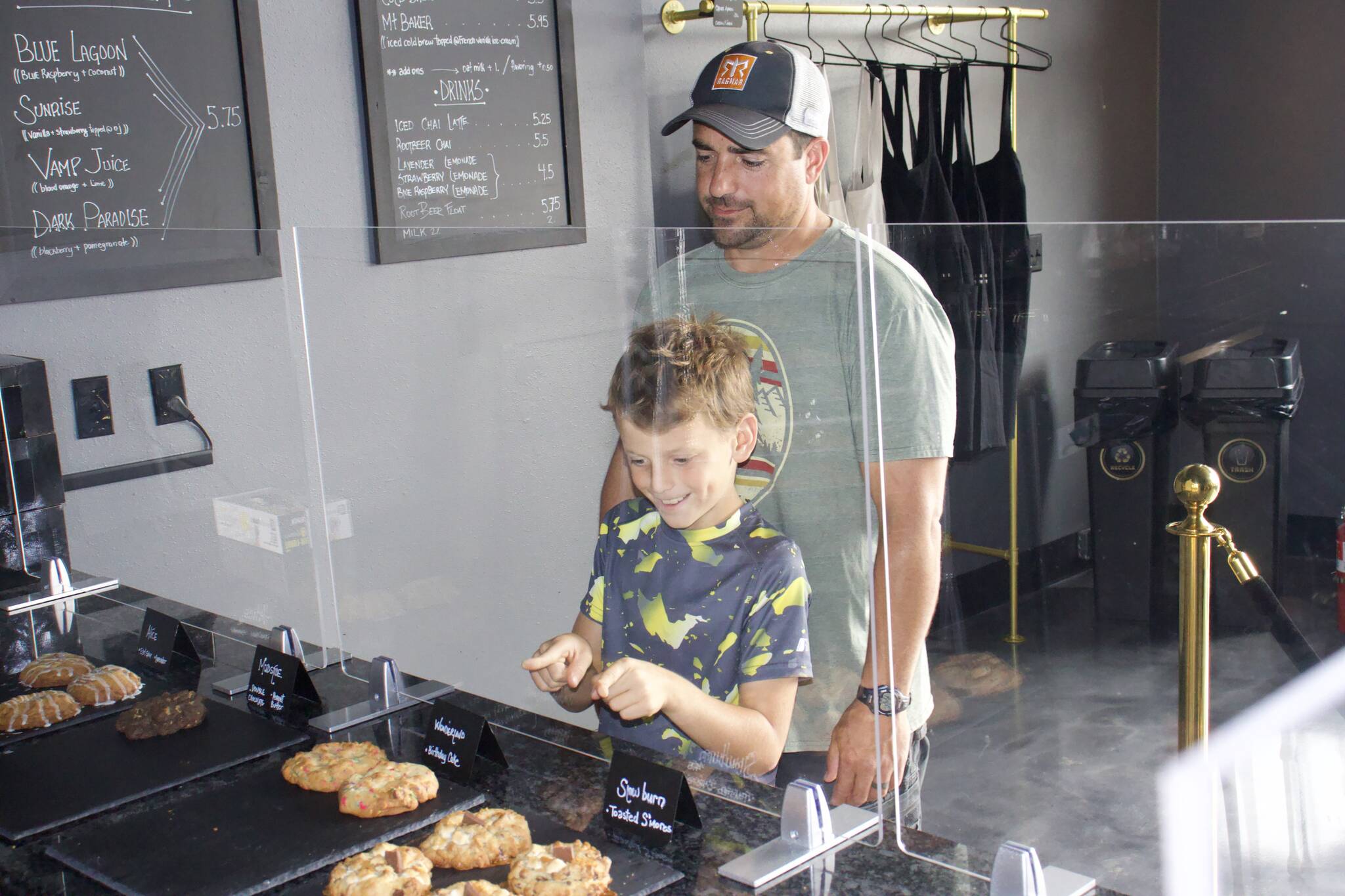 Photo by Rachel Rosen/Whidbey News-Times
Andrew Leith and his son Drew order Mad Batter cookies.