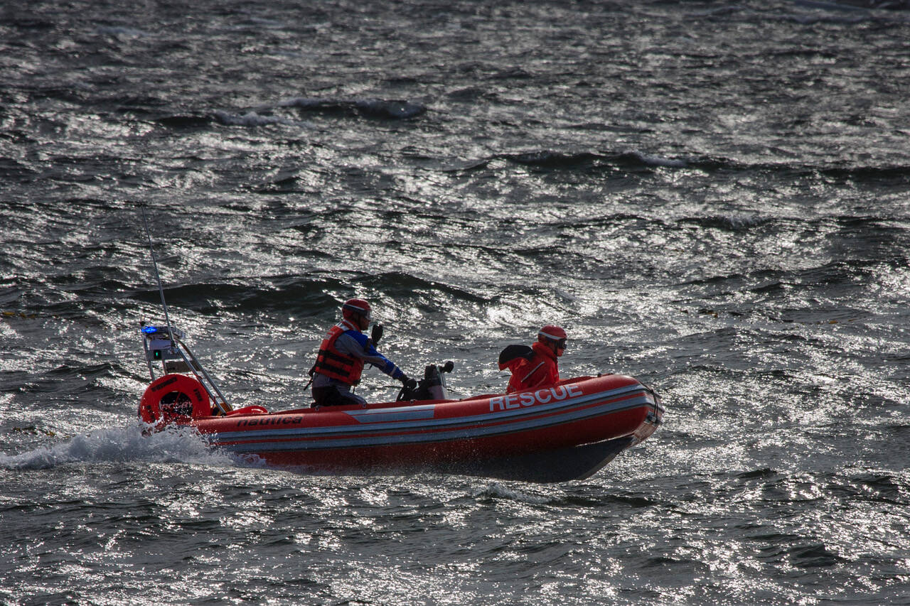 Photo by David Welton
A rescue boat traverses the rough waters near Whidbey Island.