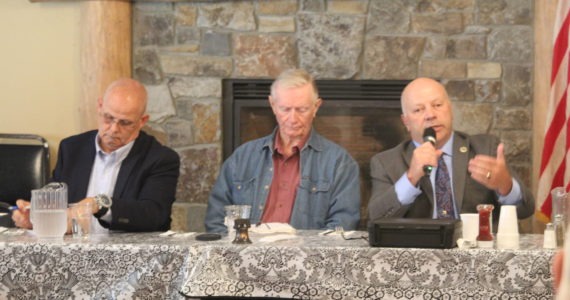 Photo by Karina Andrew/Whidbey News-Times
Island County Sheriff Rick Felici addresses the group at an Old Goats — Fully Informed Voters forum while candidate Lane Campbell, left, and moderator Rufus Rose, middle, listen on Sept. 16.