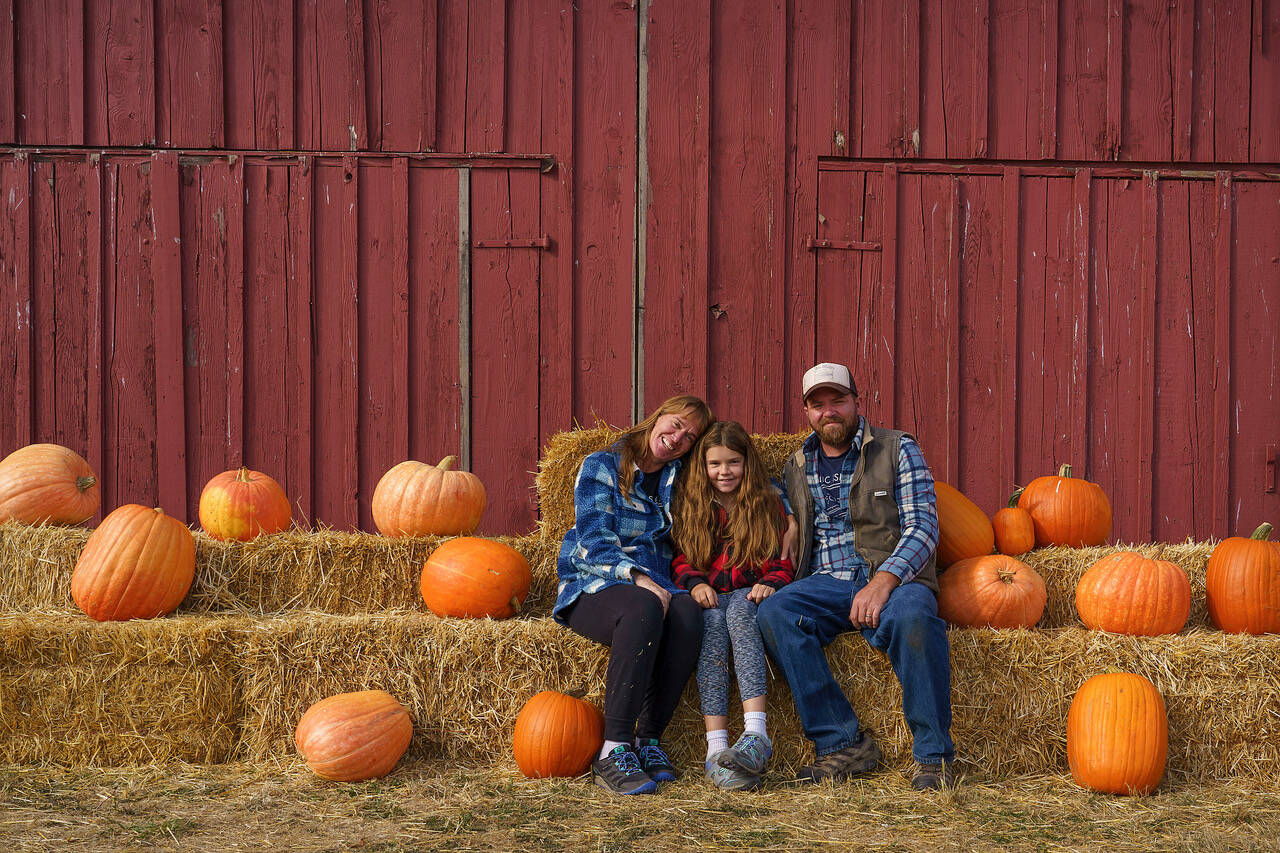 Photo by David Welton
From left, Alix, Zayne and Brandon Roos are carrying on the traditions of the Sherman family farm.