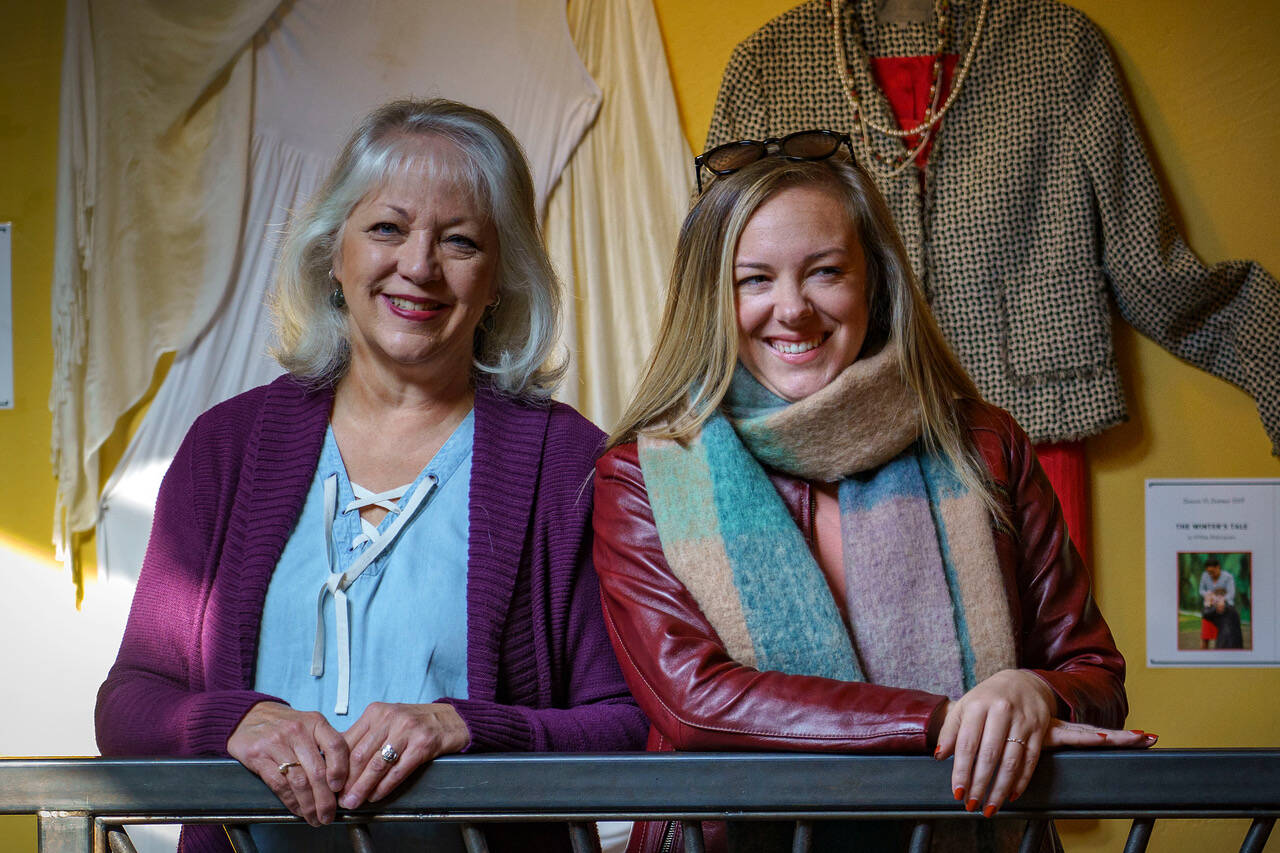 Photos by David Welton
Costume designer Valerie Johnson, left, and Island Shakespeare Festival Artistic Director Olena Hodges stand before a display of costumes worn in the theater company’s productions.