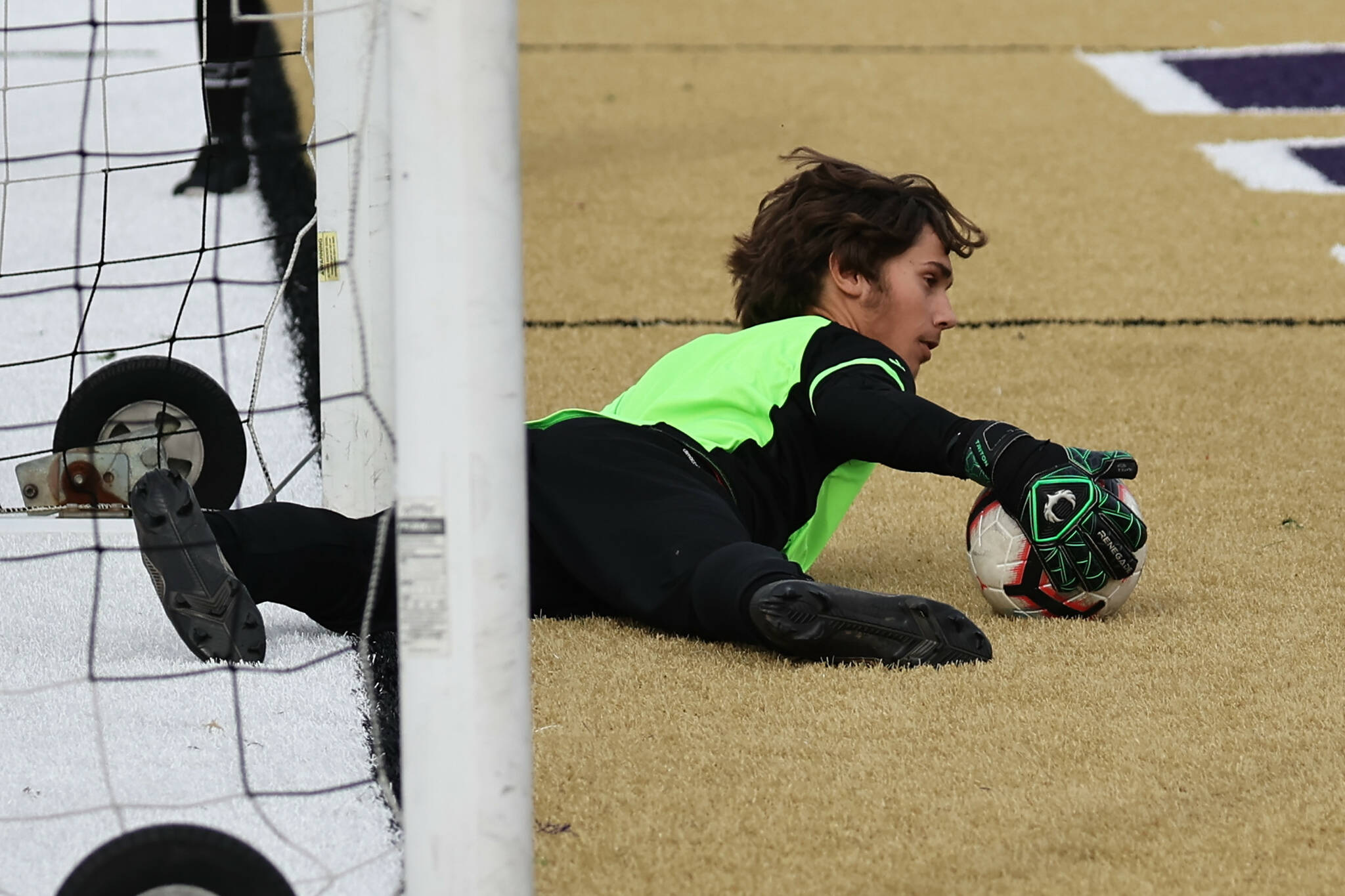 Junior Nick Guay makes a save during a game against Providence Classical Oct. 29. (Photo by John Fisken)