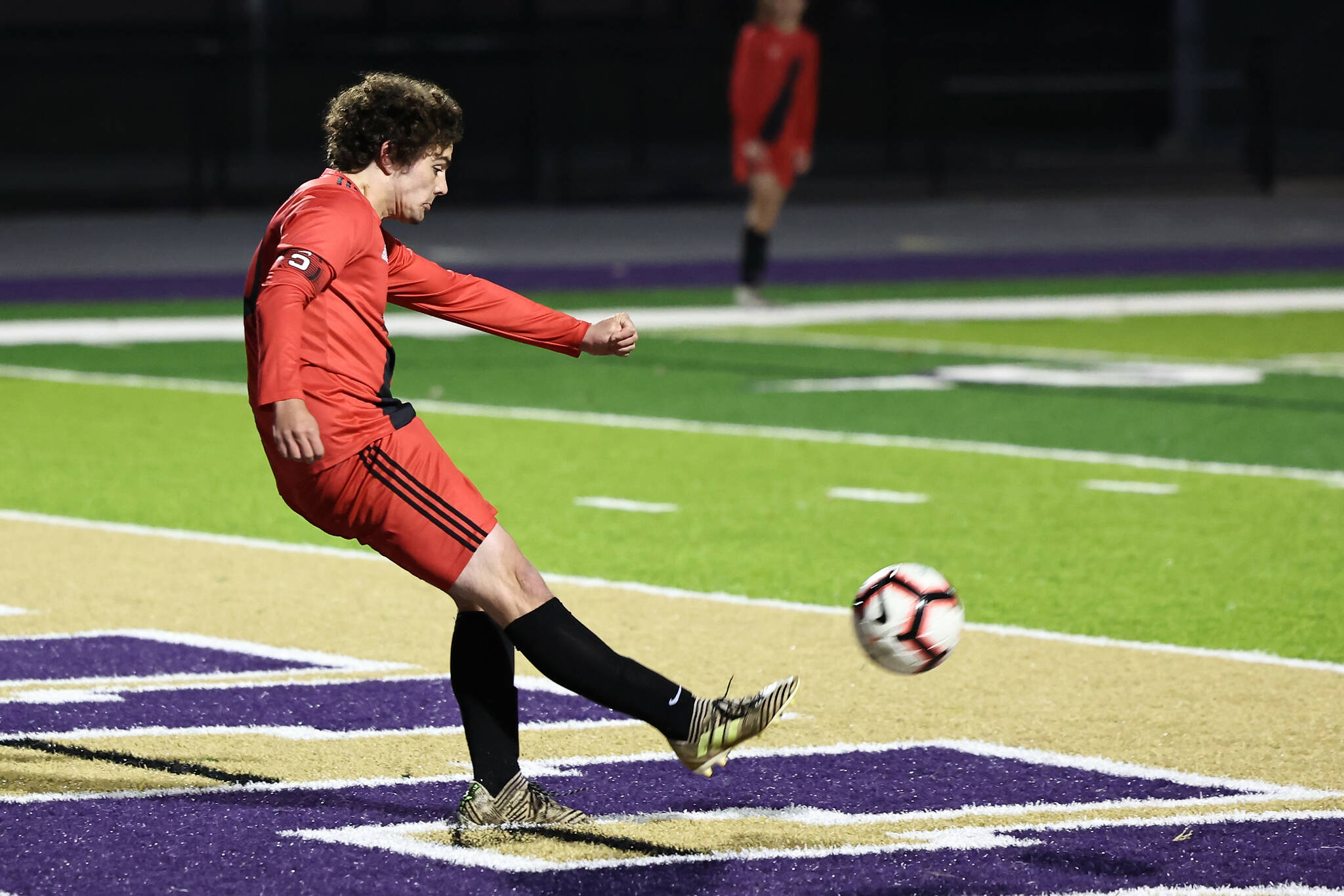 Photo by John Fisken
Grant Steller aims a kick in the Coupeville boys soccer team’s final game of the season. The Wolves were defeated 2-0 in a playoff game against Summit Atlas Nov. 1 at the Wildcat Memorial Stadium in Oak Harbor, bumping them from the tournament.