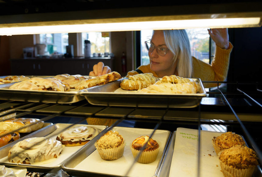 <p>Photo by David Welton</p>
                                <p>Angie Lambert-Jackson checks the display case at Cedar & Salt. All baked goods at the cafe are made from scratch and feature many local ingredients.</p>