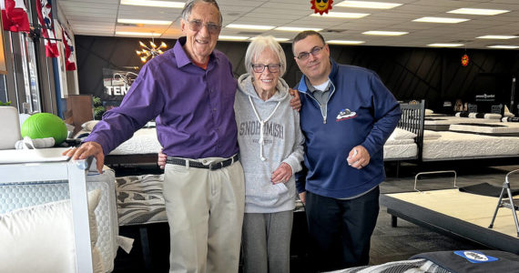 Bob and Gaile Ade with Joshua Rigsby, co-owner of ESC Mattress Center in Everett. Photo courtesy ESC Mattress Center.