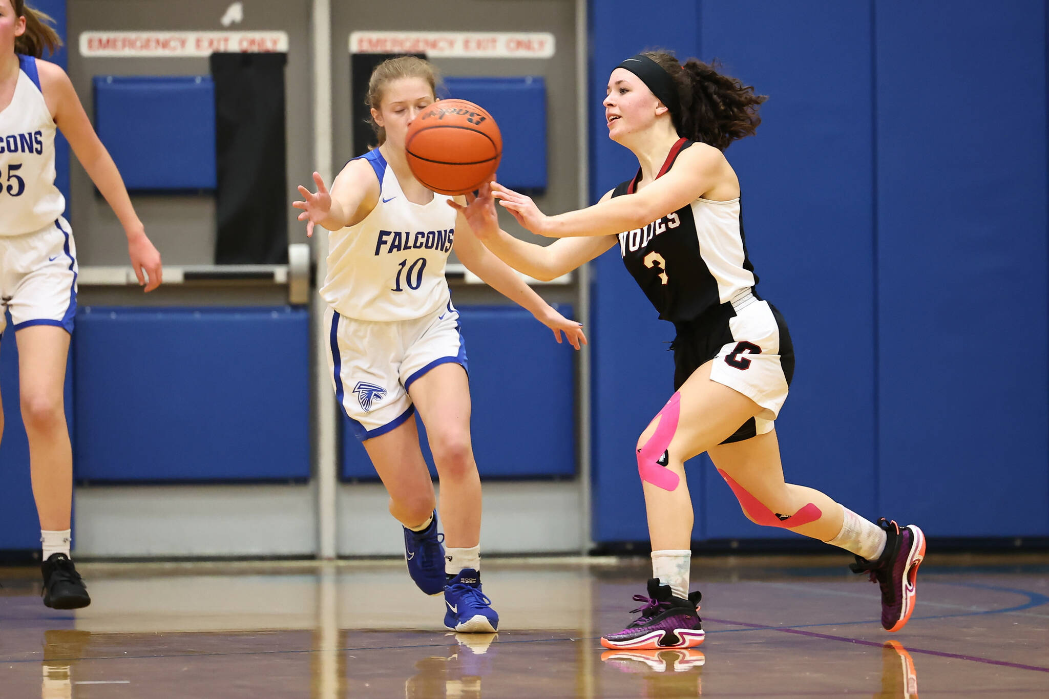 Photo by John Fisken
Coupeville athlete Gwen Gustafson chases the ball at a Nov. 30 game against South Whidbey High School. Coupeville defeated South Whidbey 46-22.