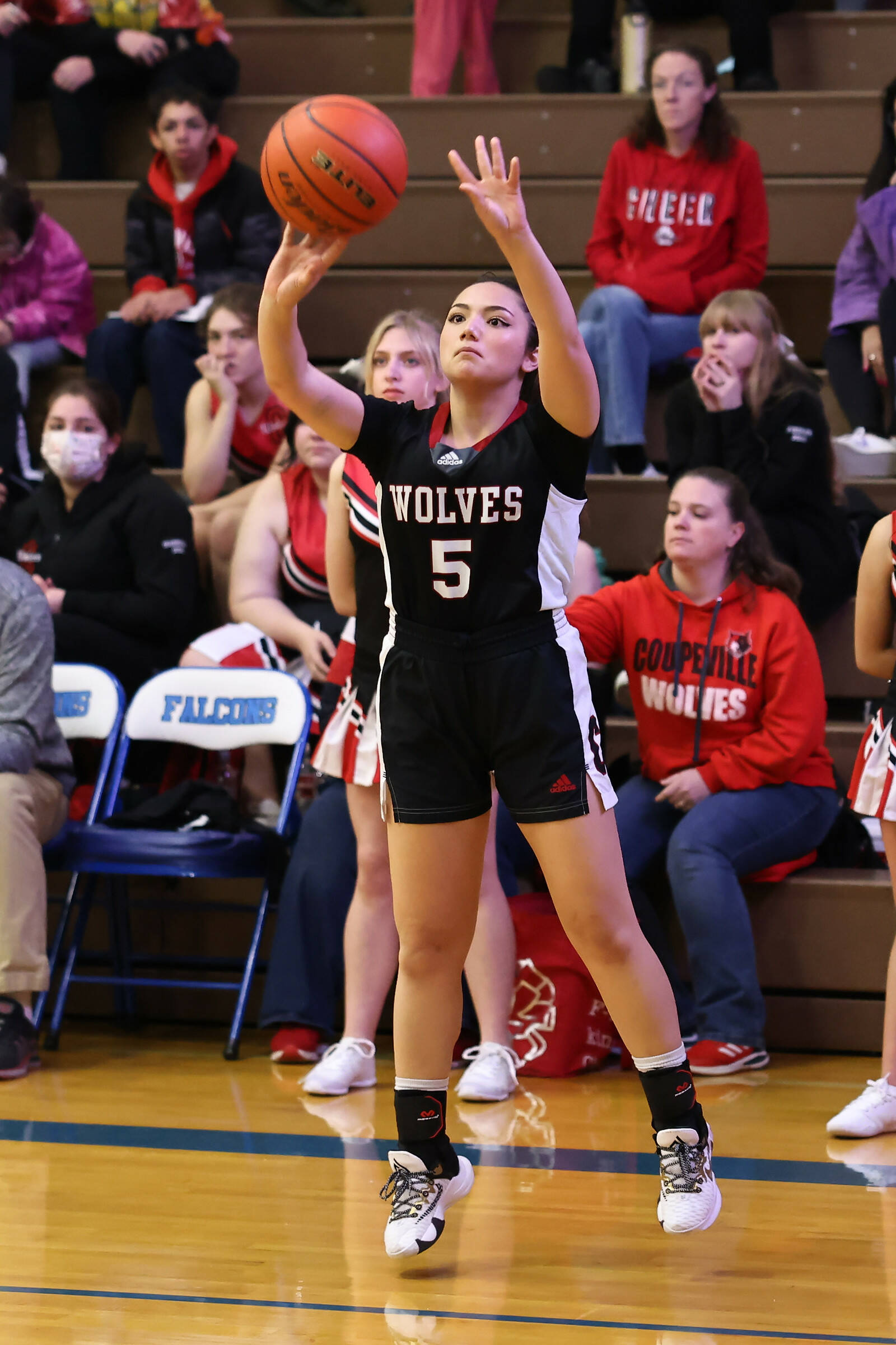 Photo by John Fisken
Coupeville athlete Alita Blouin takes a shot at a Nov. 30 game against South Whidbey High School. Coupeville defeated South Whidbey 46-22.