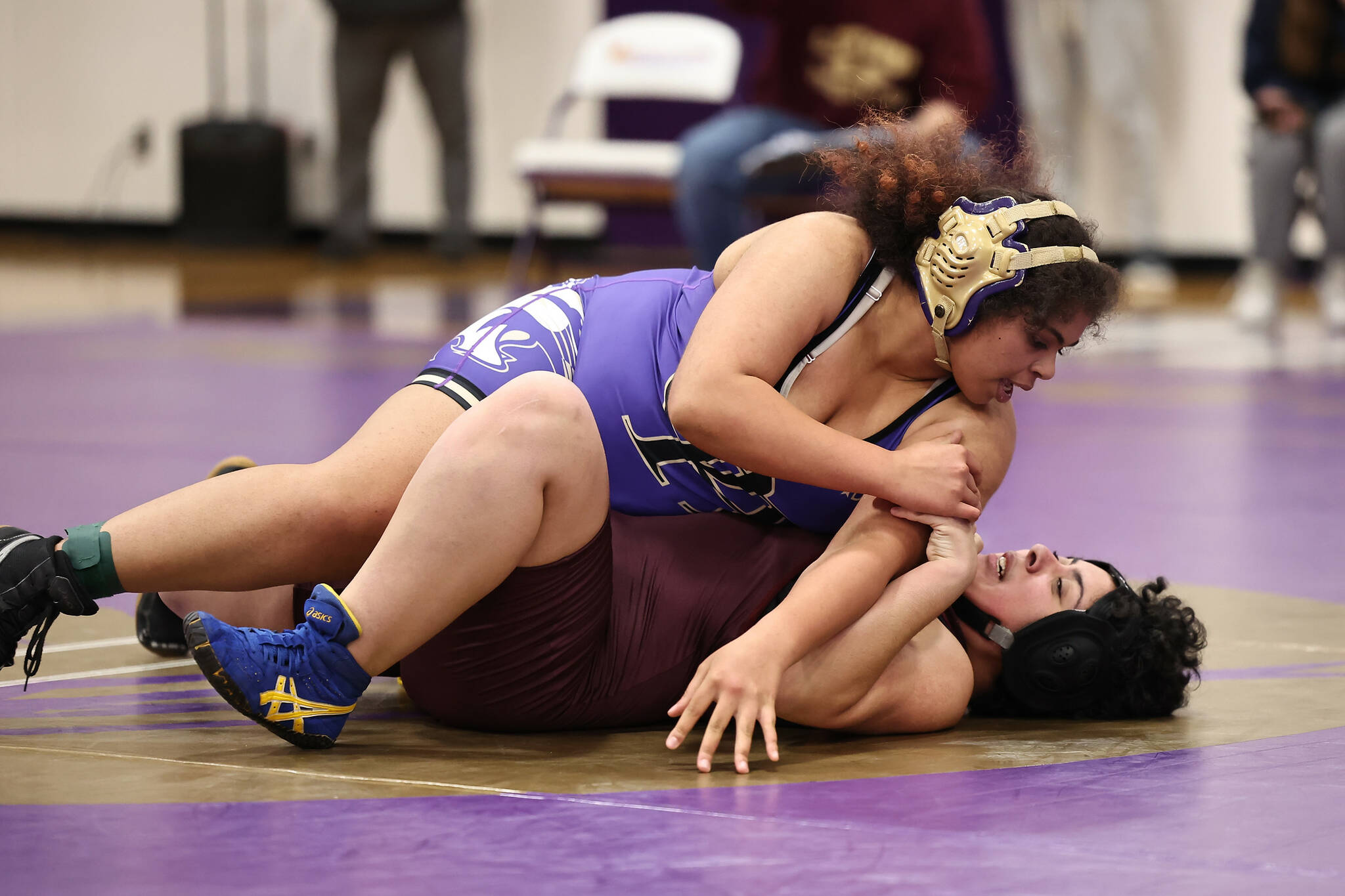 Photo by John Fisken
Oak Harbor athlete Tiayanna Gibson wrestles with Lakewood athlete Abby Loza during a Dec. 7 match. Oak Harbor defeated Lakewood 66-12 at the first competition of the season.