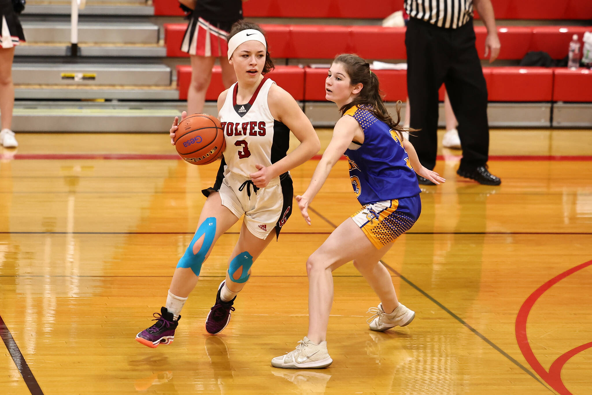 Photo by John Fisken
Coupeville High School Senior Gwen Gustafson tries to break past a Crescent defender during a basketball game Wednesday night. The girls team beat visiting Crescent 46-22.