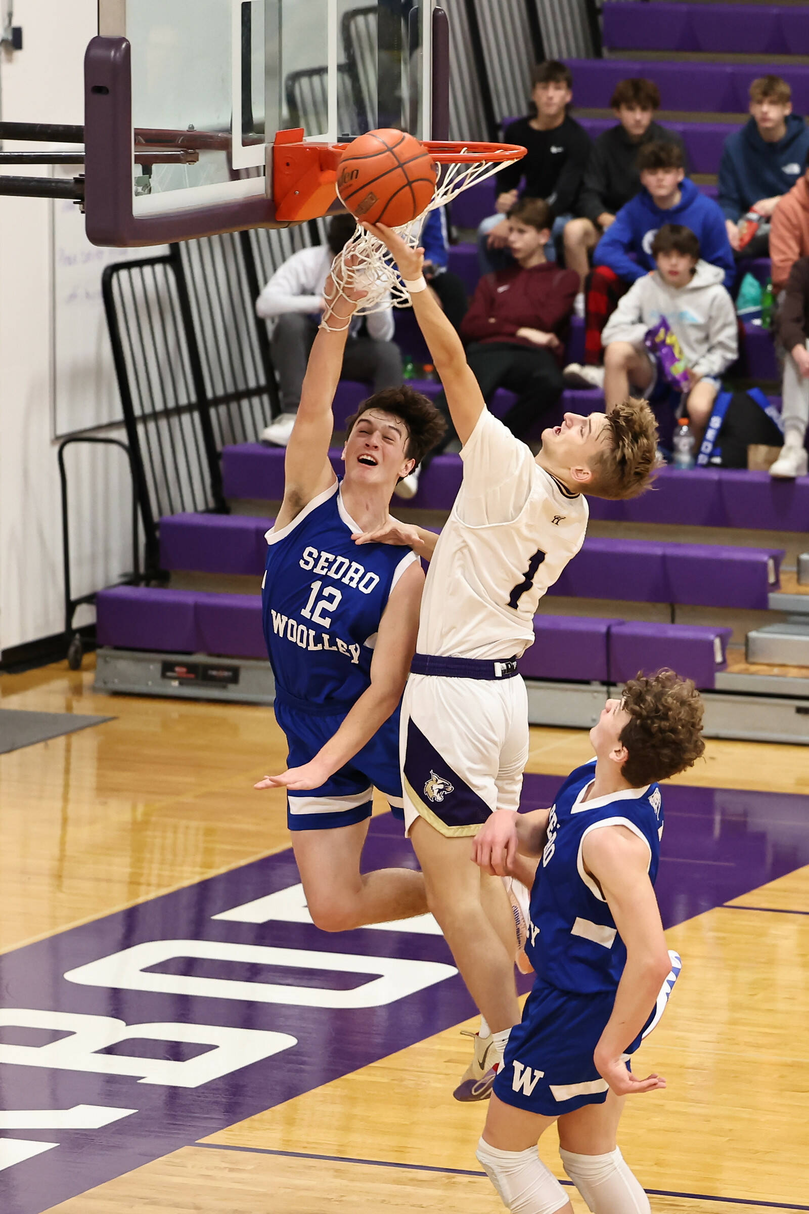 Photo by John Fisken
Oak Harbor athlete Brock Boyer makes a layup at a Dec. 17 game against Sedro-Woolley. The Oak Harbor boys varsity team narrowly lost 62-59 in overtime. The team is 2-4 this season.