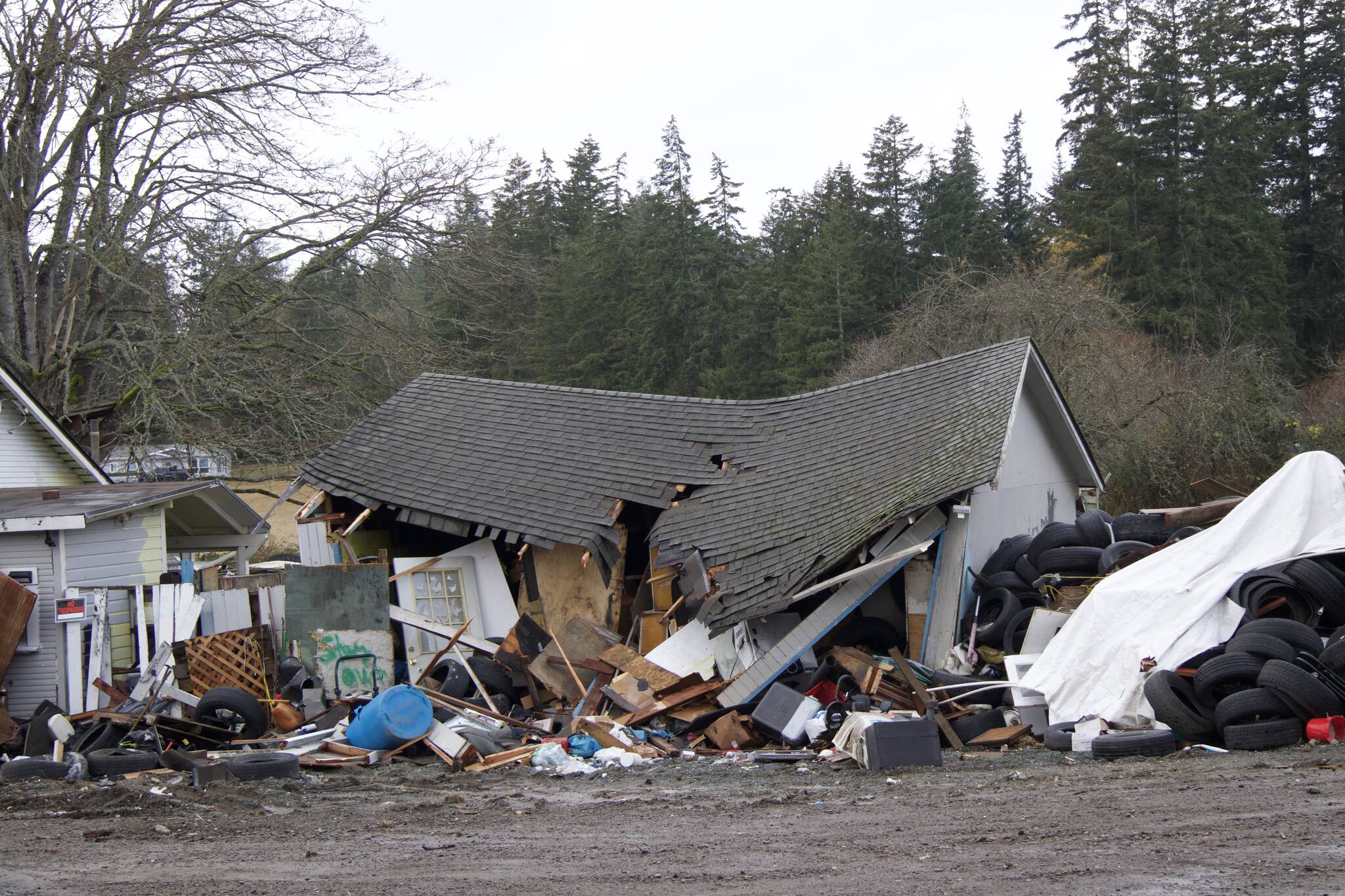 Photo by Rachel Rosen/Whidbey News-Times
Tires, bicycles and vehicles are among the garbage that has been dumped on the North Whidbey property.