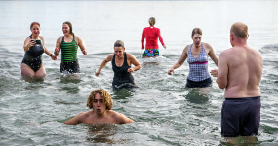 Photo by David Welton
People of all ages rang in the new year by taking an icy dip in the waters of Double Bluff Beach in Freeland on New Year’s Day. A total of 158 participants registered for the annual Polar Bear Dive event, from the ages of 4 to 79.