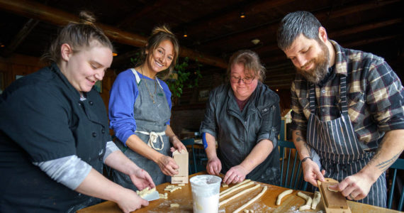 Photo by David Welton
From left, Amy Wise, Courtney Storer, Alison Wiefels and Captain Whidbey head chef Sean Prater make homemade pasta.