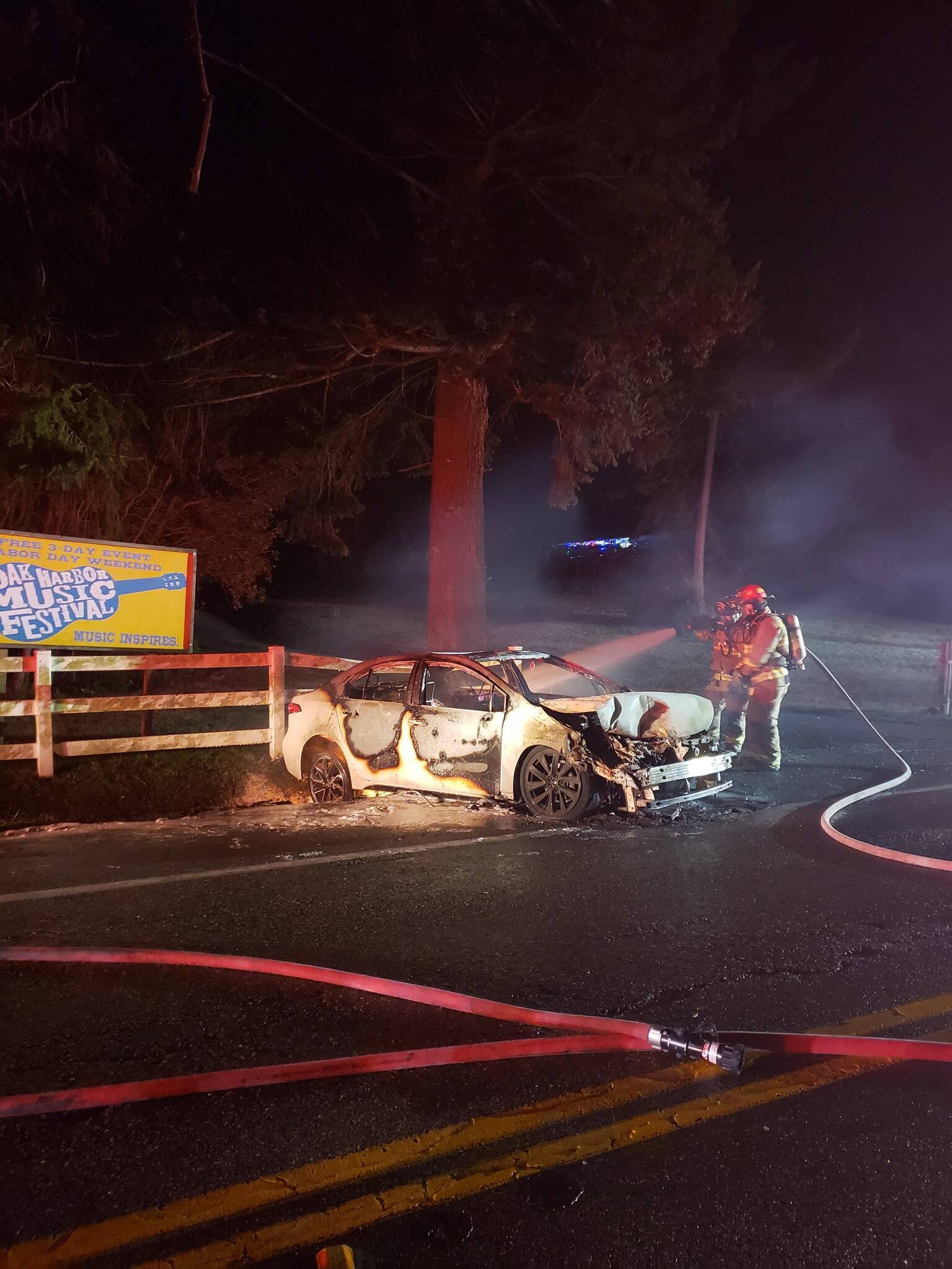 North Whidbey Fire and Rescue firefighters put out a car fire early Wednesday morning. (Photo provided)